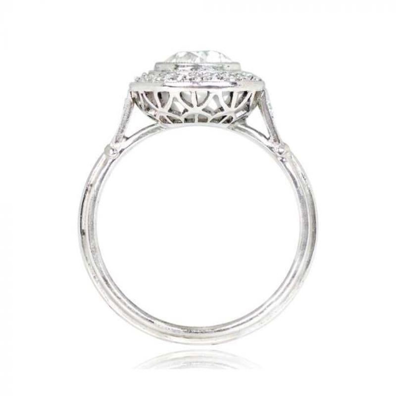 An expertly handcrafted Art Deco-style ring in platinum, showcasing a 1.00-carat old European cut diamond with J color and VS2 clarity. The center stone's lively brilliance is complemented by a row of 0.22 carats of old mine-cut diamonds. Two