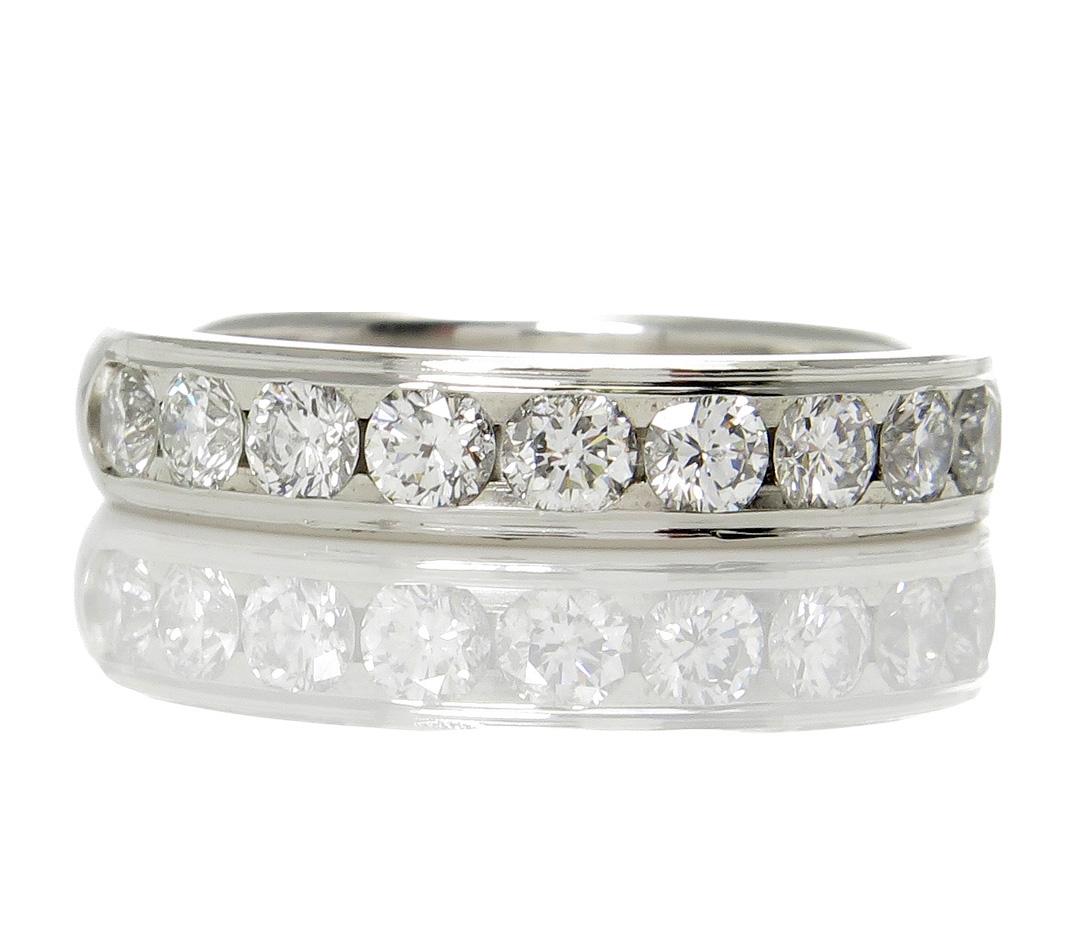 GORGEOUS Round Brilliant cut Diamond Ring from our EXQUISITE Estate Diamond Band design collection! Made by Benchmark USA.

Round Brilliant cut Diamonds in F color VS2 clarity set all around in finger size 6 (limited sizing options). It is the