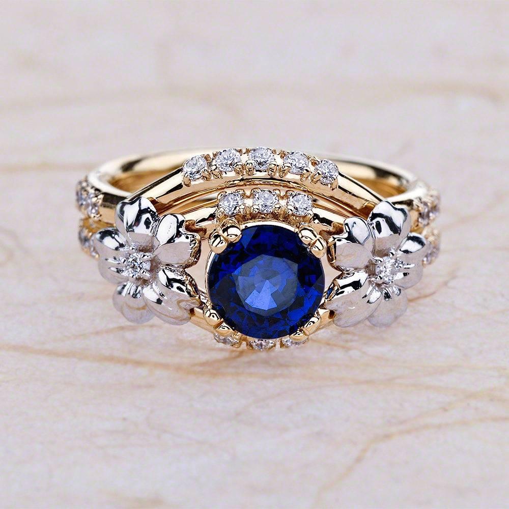 Modern 1.00 Carat Round Cut Blue Sapphire Engagement Ring Set in 14 Karat Gold For Sale