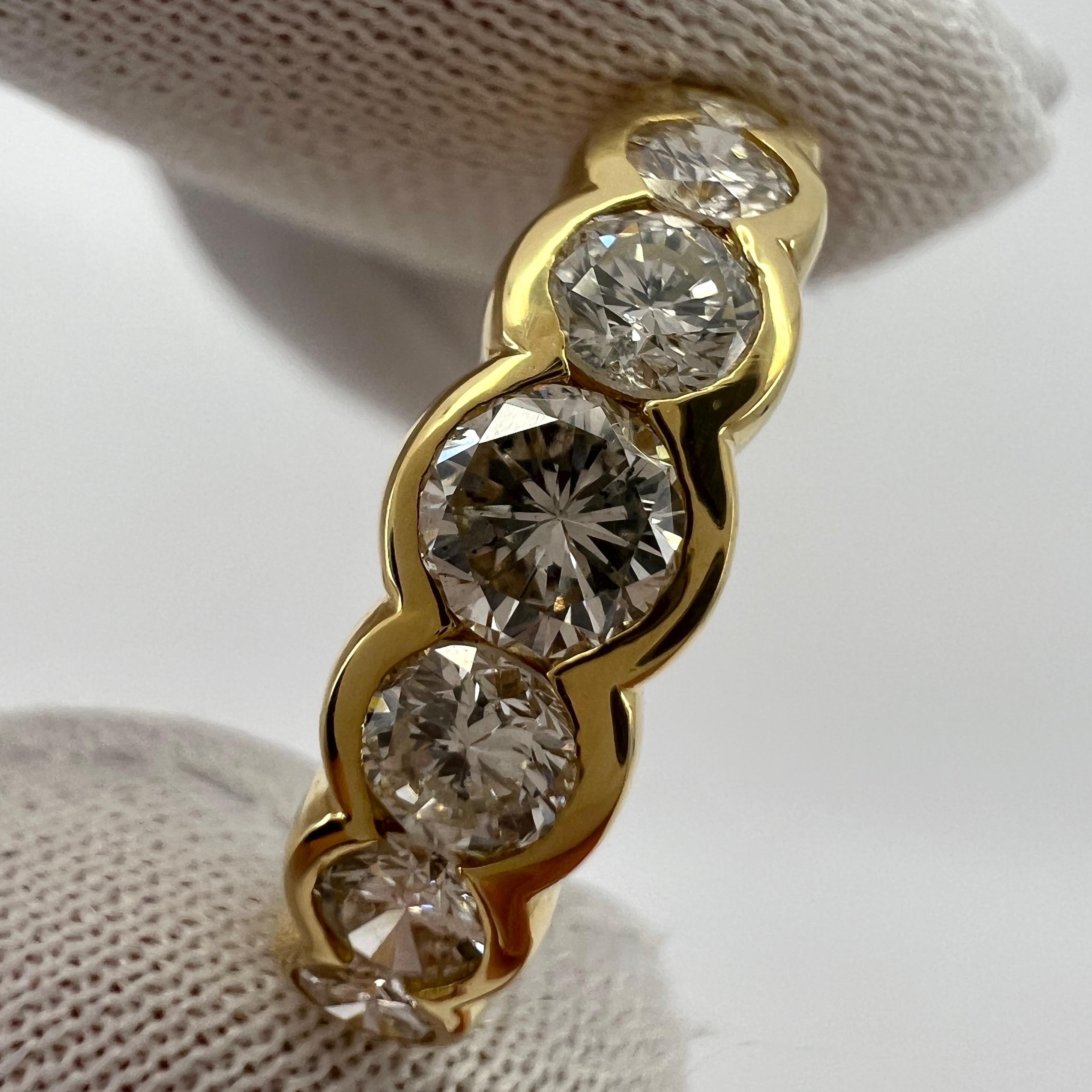 Natural Diamond Graduating Half Eternity Seven Stone 18k Yellow Gold Ring.

This beautifully made ring features seven round brilliant cut diamonds in a graduating half eternity style.
The diamonds total 1.00 carat. All with an excellent round