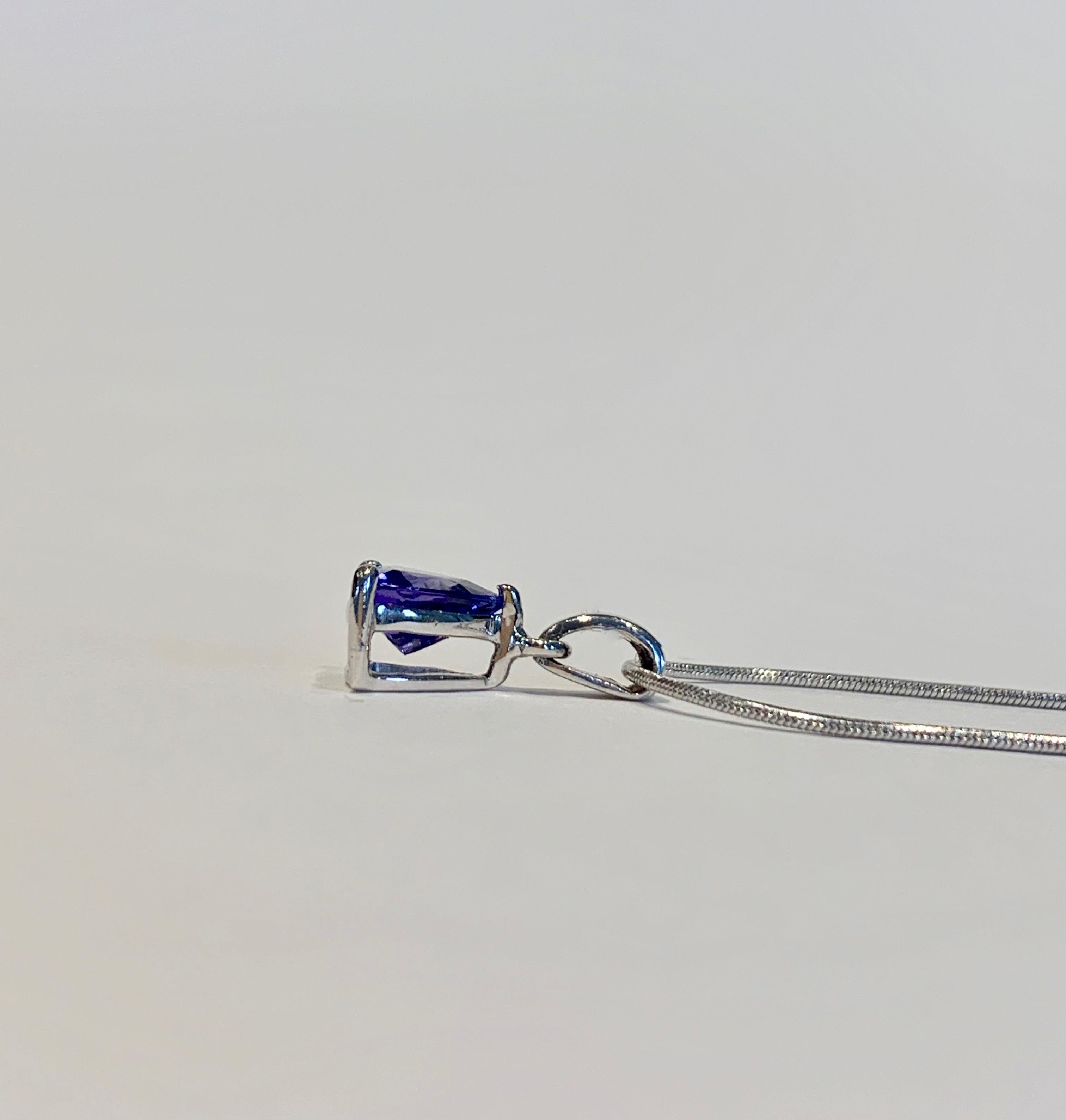 Modern 1.00ct Trillion Cut Tanzanite Pendant in 18ct White Gold with 18ct Snake Chain For Sale