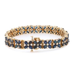 1.00Cttw Diamond & 8.00Cttw Blue Sapphire Tennis Bracelet 14K Yellow Gold