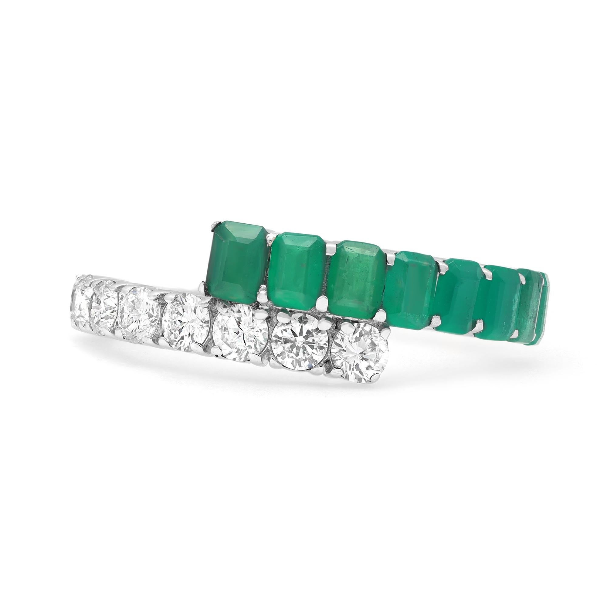 Simple and elegant, Green Emerald and diamond ladies ring. Crafted in high polished 14k white gold. It features two half rows of prong set 8 round brilliant cut diamonds and 8 Emerald Cut Emeralds for a timeless, eye catchy style. Total diamond