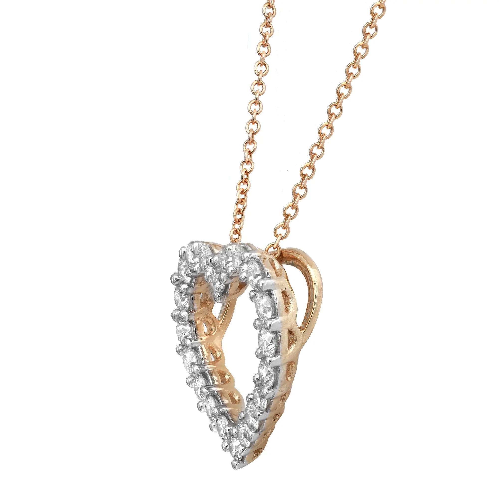 This classic natural diamond heart pendant showcases prong set white sparkling round cut diamonds in a heart-shaped cut out design. Crafted in 14K yellow gold. Total diamond weight: 1.00 carat. Each diamond is of VS-SI clarity and H-I color. This
