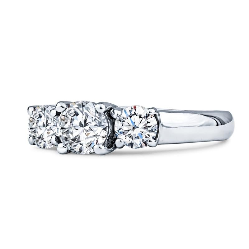 This engagement ring features 1.00ctw of three prong-set round brilliant diamonds in a platinum ring. The size is currently a 5.75 but it may be sized smaller or larger upon request.