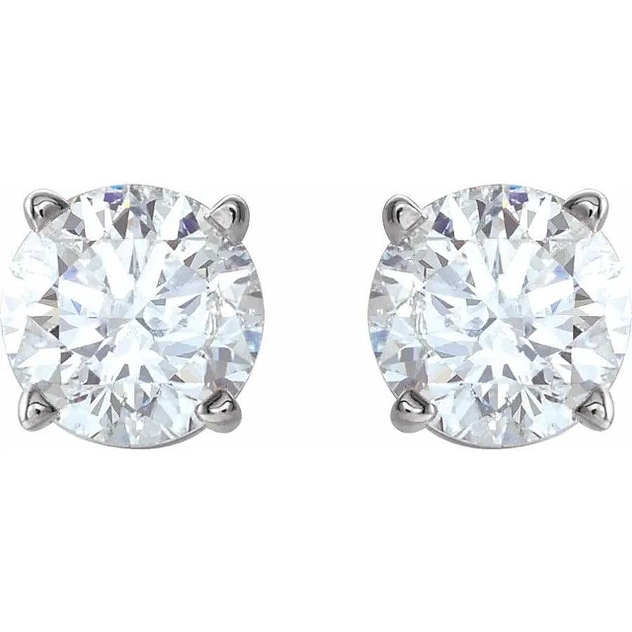 A classic diamond stud earring featuring 1.00ctw diamonds set in a 14k white gold 4 prong basket. Friction post and back. 
Diamond: E-F color & I1 clarity