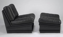 100xbtr Contemporary DB Chair with Ottoman in Black Leather and Paperstone Base