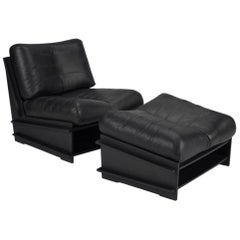 100xbtr Contemporary DB Chair with Ottoman in Black Leather and Paperstone Base