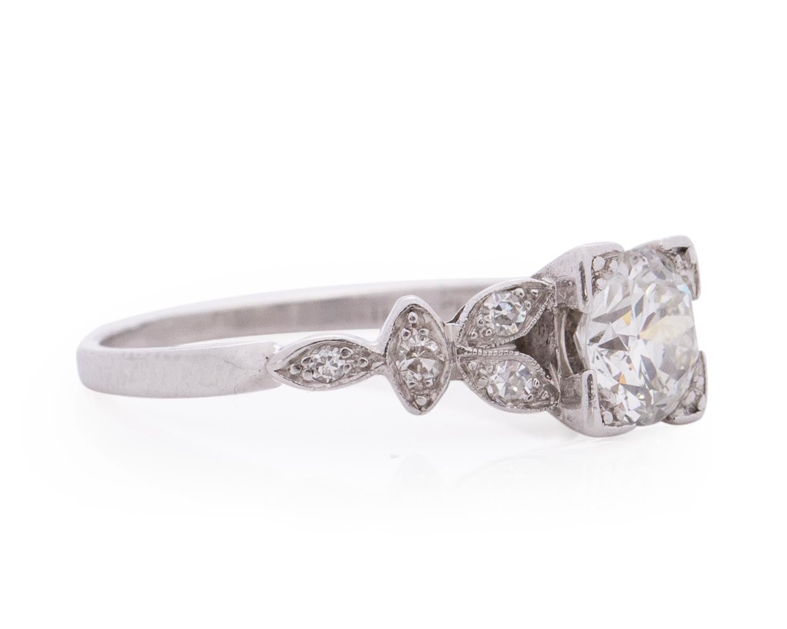 Item Details: 
Ring Size: 7.75
Metal Type: Platinum [Hallmarked, and Tested]
Weight: 3.4 grams

Center Diamond Details:
Weight: 1.01 Carat
Cut: Old European brilliant
Color: G
Clarity: SI2
Measurements: 6.5mm x 6.5mm

Side Stone Details:
Weight: .10