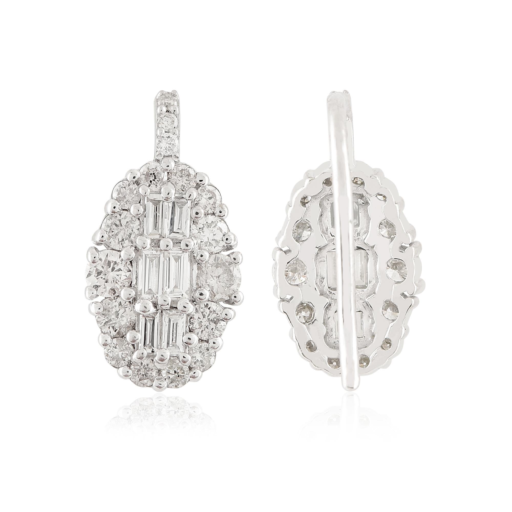 Introducing these exquisite 1.01 carat baguette diamond designer hook earrings, crafted in solid 10k white gold. These stunning earrings are a true testament to elegance and sophistication, making them a perfect accessory for any occasion.

Item