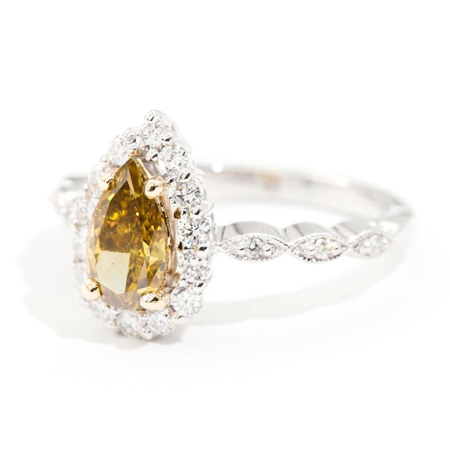 1.01 Carat Certified Fancy Yellow Pear Diamond and 0.42 Carat Engagement Ring For Sale 5