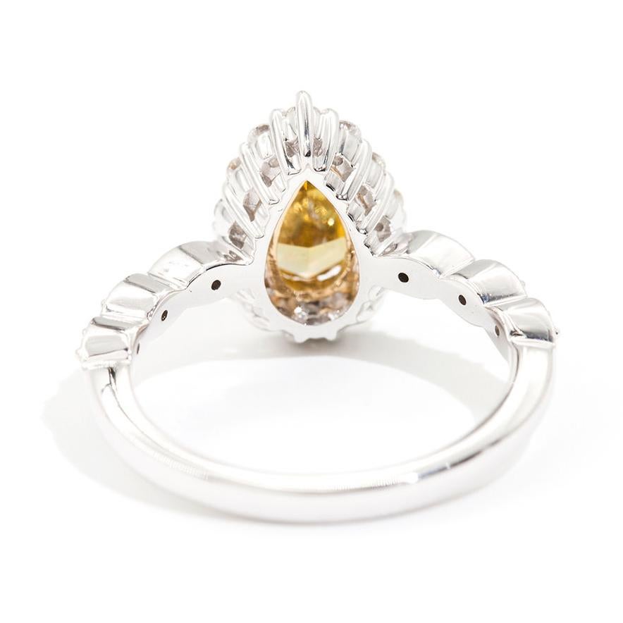 1.01 Carat Certified Fancy Yellow Pear Diamond and 0.42 Carat Engagement Ring For Sale 3