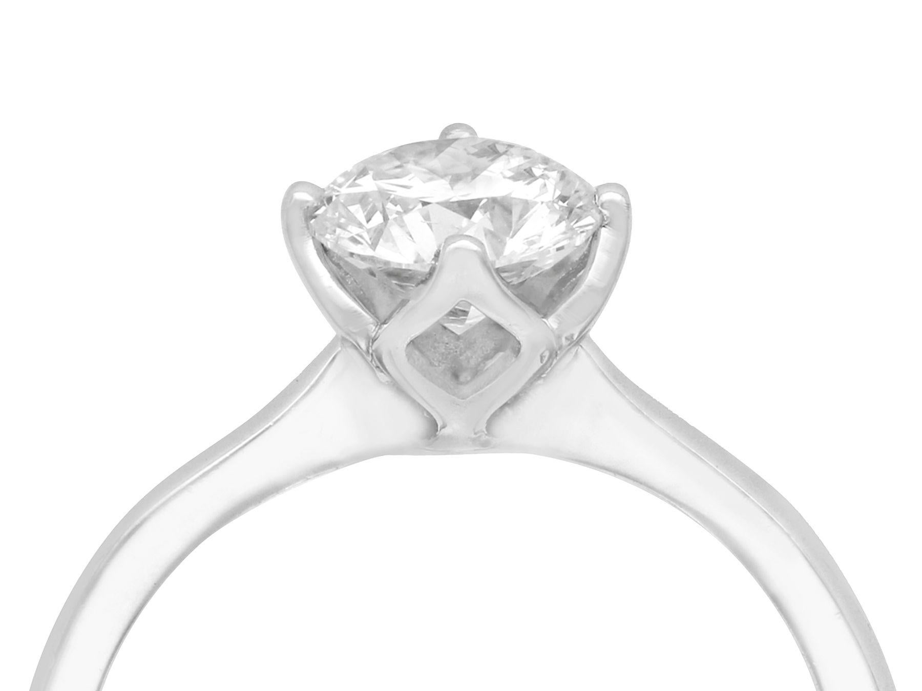 A fine 1.01 carat modern brilliant round cut contemporary diamond solitaire ring in platinum; part of our diverse diamond jewelry/jewelry collection.

This fine contemporary diamond ring has been crafted in platinum.

The 1.01cts modern brilliant