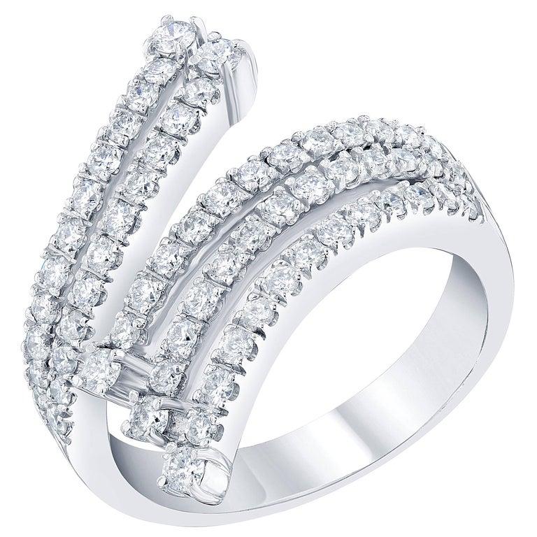 Bold and Beautiful Cocktail Ring with Diamonds. 

This ring has 63 Round Cut Diamonds that weigh 1.01 Carats (Clarity: SI2, Color: F).  
It is crafted in 14 Karat White Gold and has an approximate weight of 8.2 grams. 

The ring is a size 7 and can