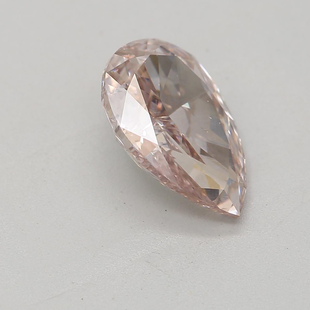 Women's or Men's 1.01 Carat Fancy Brown Pink Pear cut diamond SI1 Clarity GIA Certified For Sale