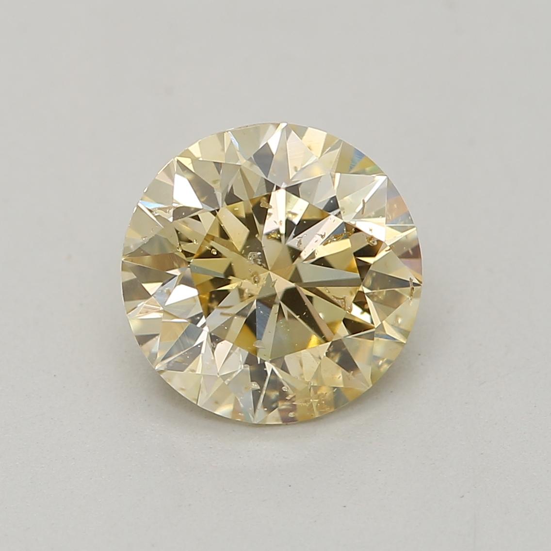 *100% NATURAL FANCY COLOUR DIAMOND*

✪ Diamond Details ✪

➛ Shape: Round
➛ Colour Grade: Fancy Brownish Yellow
➛ Carat: 1.01
➛ Clarity: I2
➛ GIA Certified 

^FEATURES OF THE DIAMOND^

Our 1.01 carat diamond refers to the weight of the diamond. It's