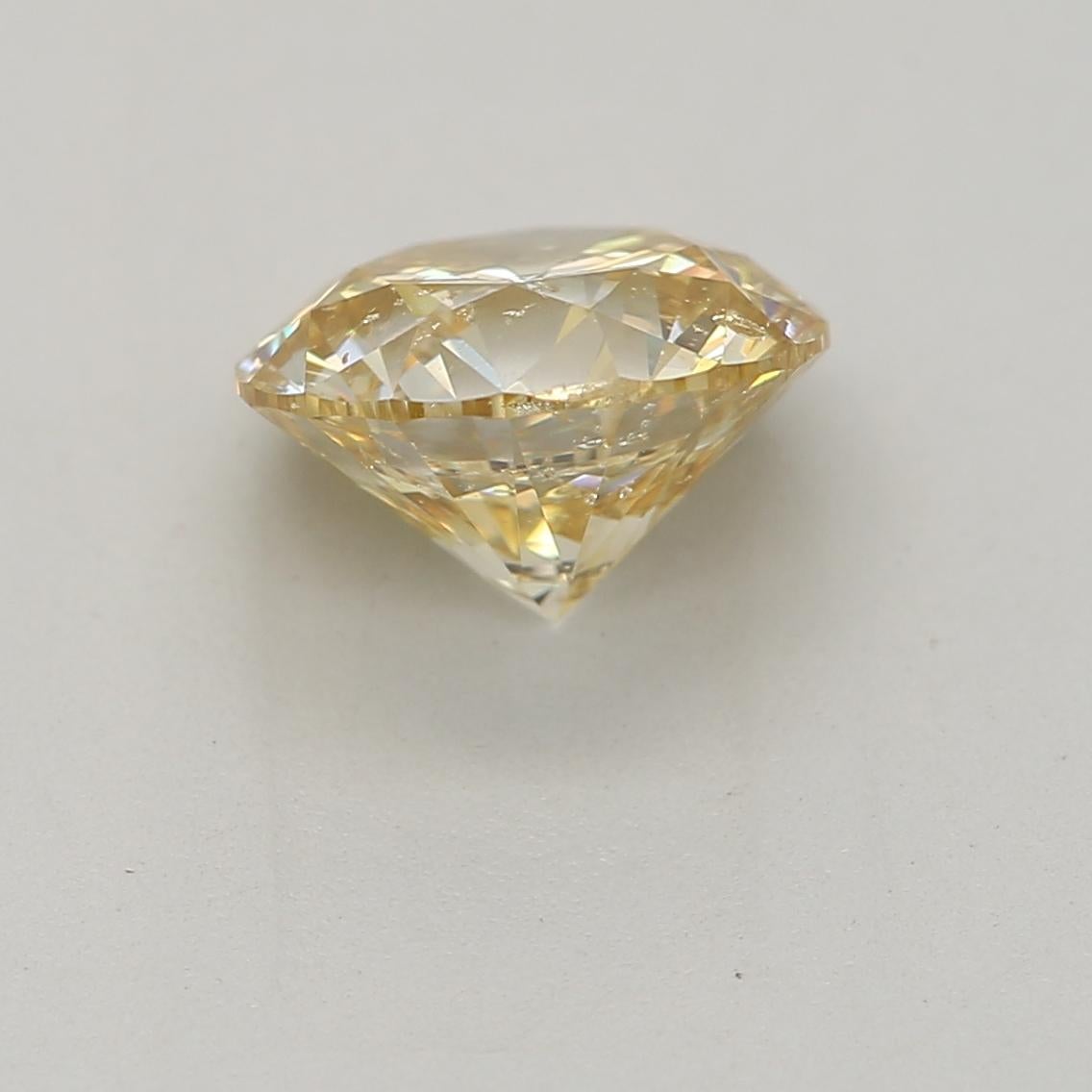 Round Cut 1.01-CARAT, FANCY BROWNISH YELLOW ROUND CUT DIAMOND I2 Clarity GIA Certified For Sale