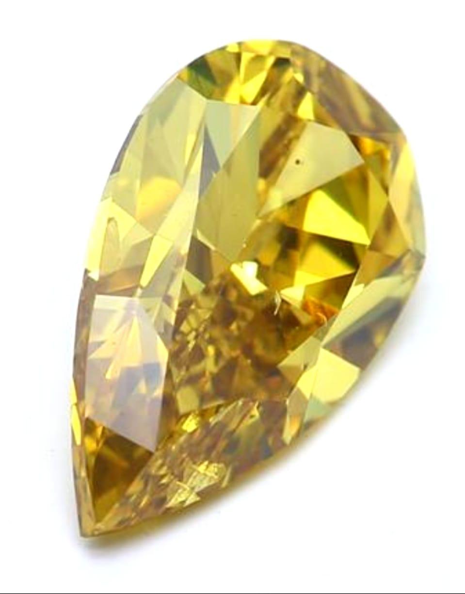 Women's or Men's 1.01 Carat Fancy Deep Yellow Pear Cut Diamond GIA Certified For Sale