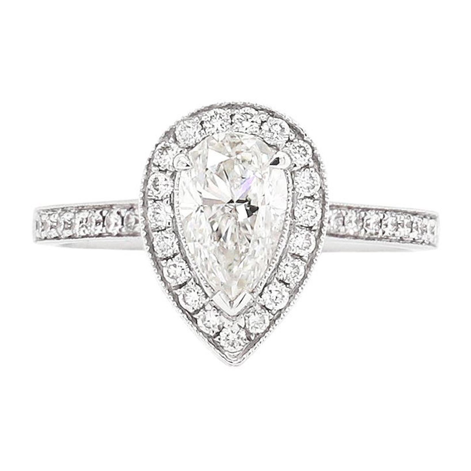1.01 Carat G SI1 Pear Shape Diamond Halo 18 Carat White Gold Engagement Ring