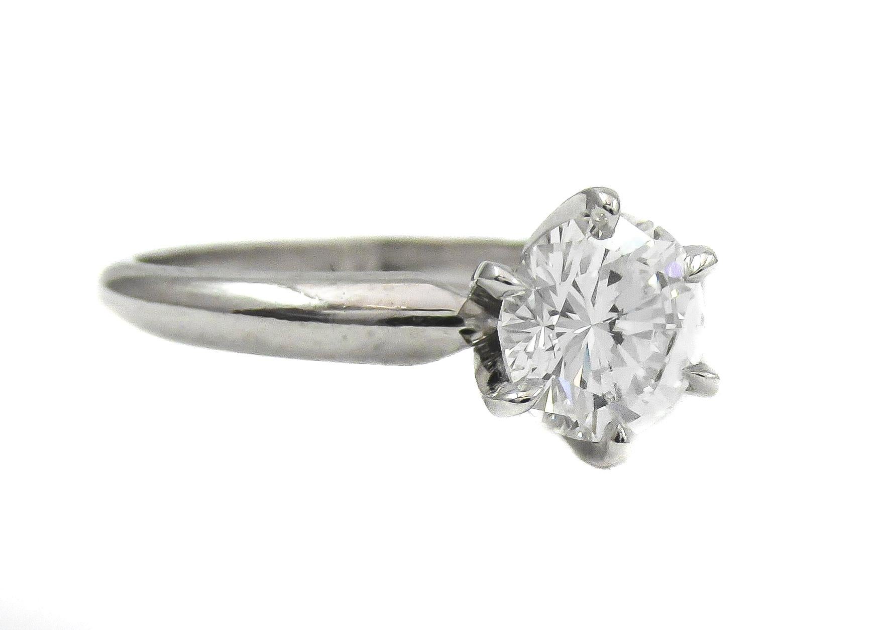The very best is displayed in this wonderful sparkling, bright and white diamond engagement ring. Not requiring any further embellishment, this GIA certified round brilliant cut diamond is simply set in a platinum mounting being securely held by 6