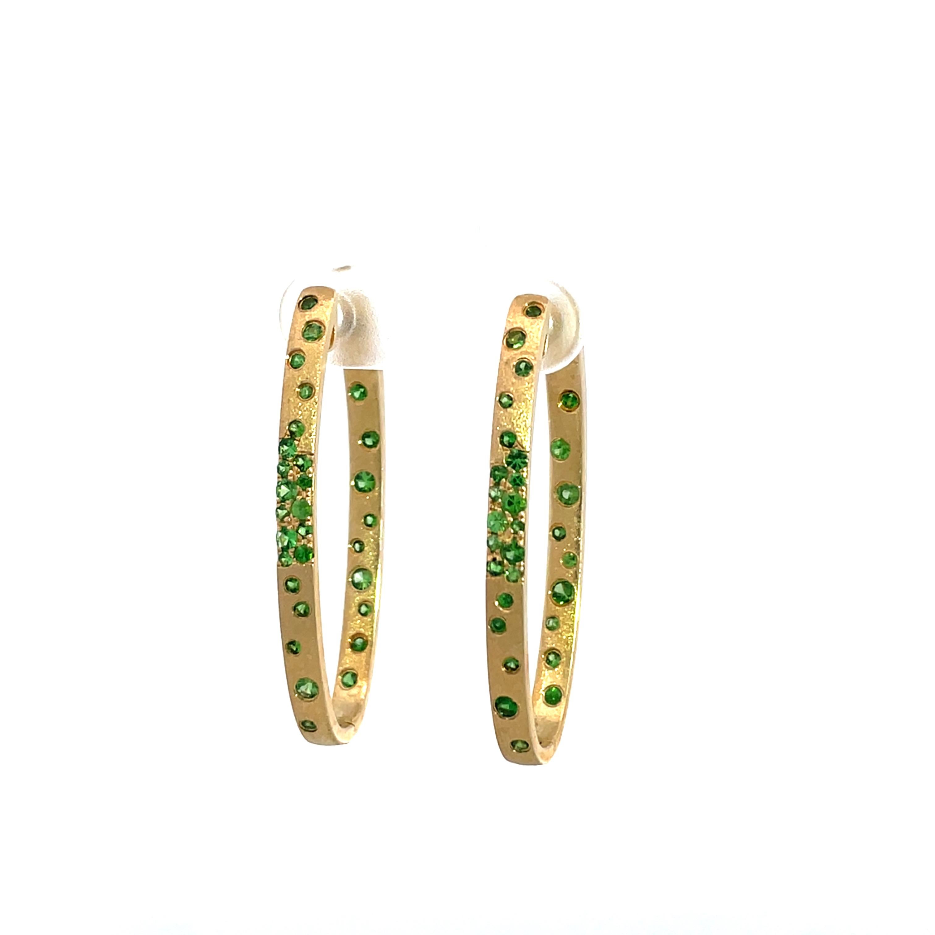 1.01 Carat Green Tsavorite Flush Set Oval Hoop Yellow Gold Earrings In New Condition For Sale In Great Neck, NY