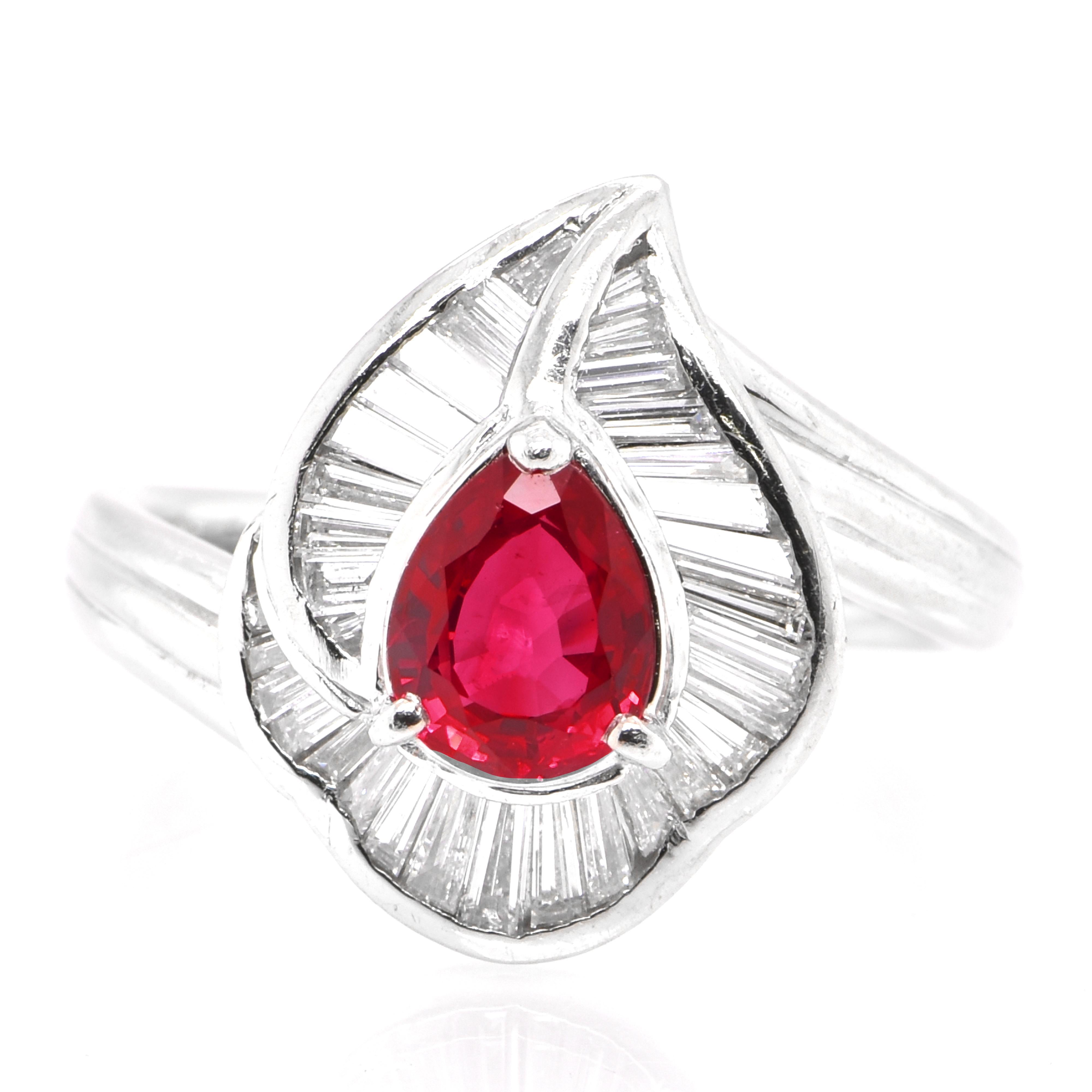 A beautiful ring set in Platinum featuring a 1.01 Carat Natural Ruby and 0.48 Carat Diamonds. Rubies are referred to as 