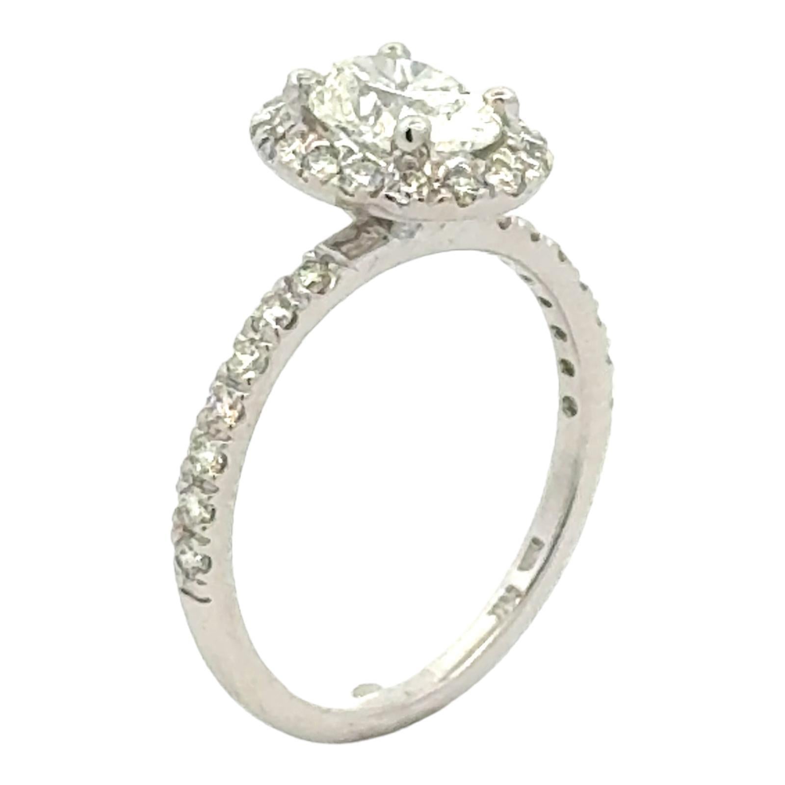 Women's 1.01 Carat Oval Diamond Halo 14 Karat White Gold Modern Engagment Ring