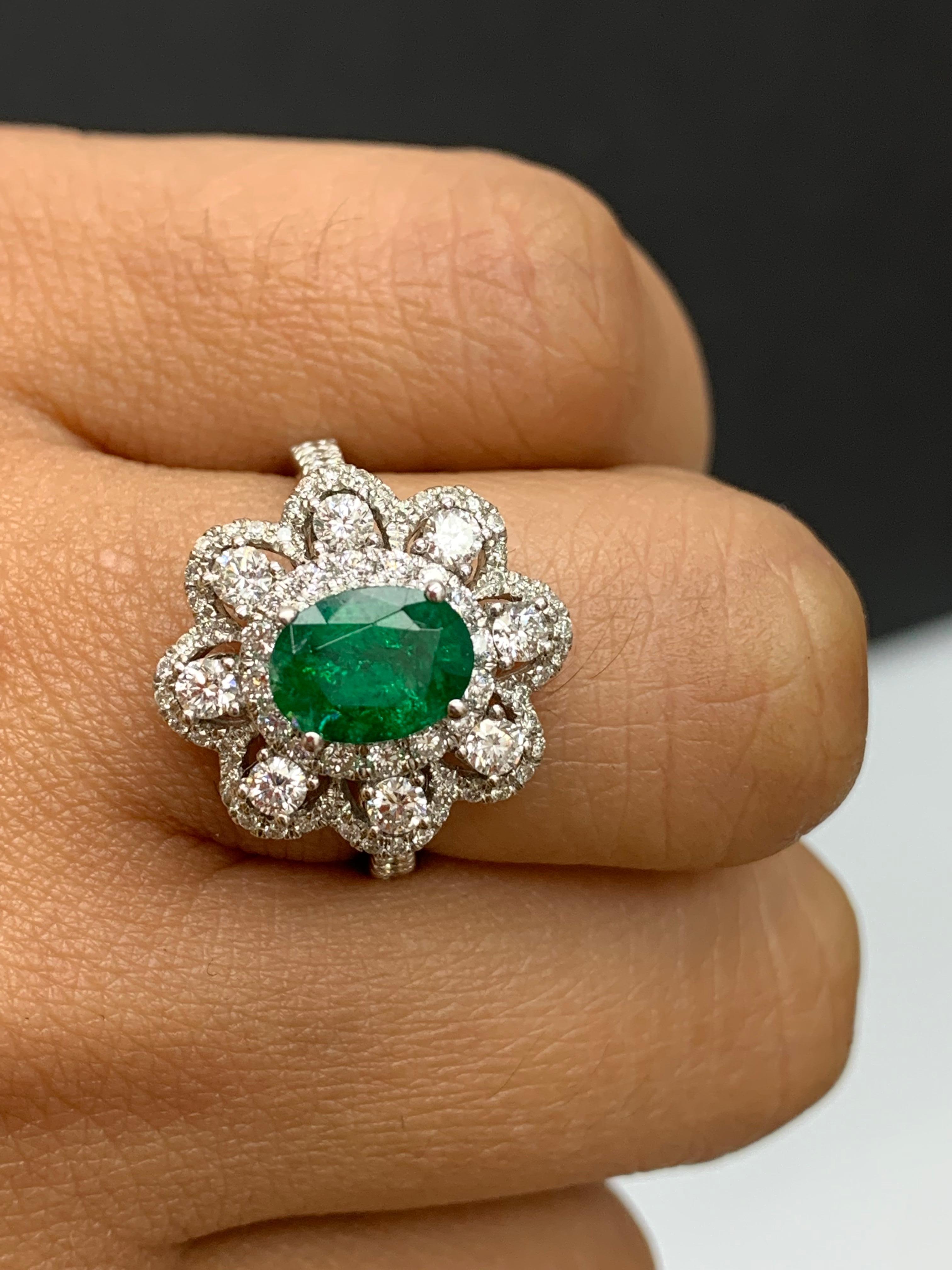 1.01 Carat Oval Emerald and Diamond Cocktail Flower Ring in 18K White Gold For Sale 4