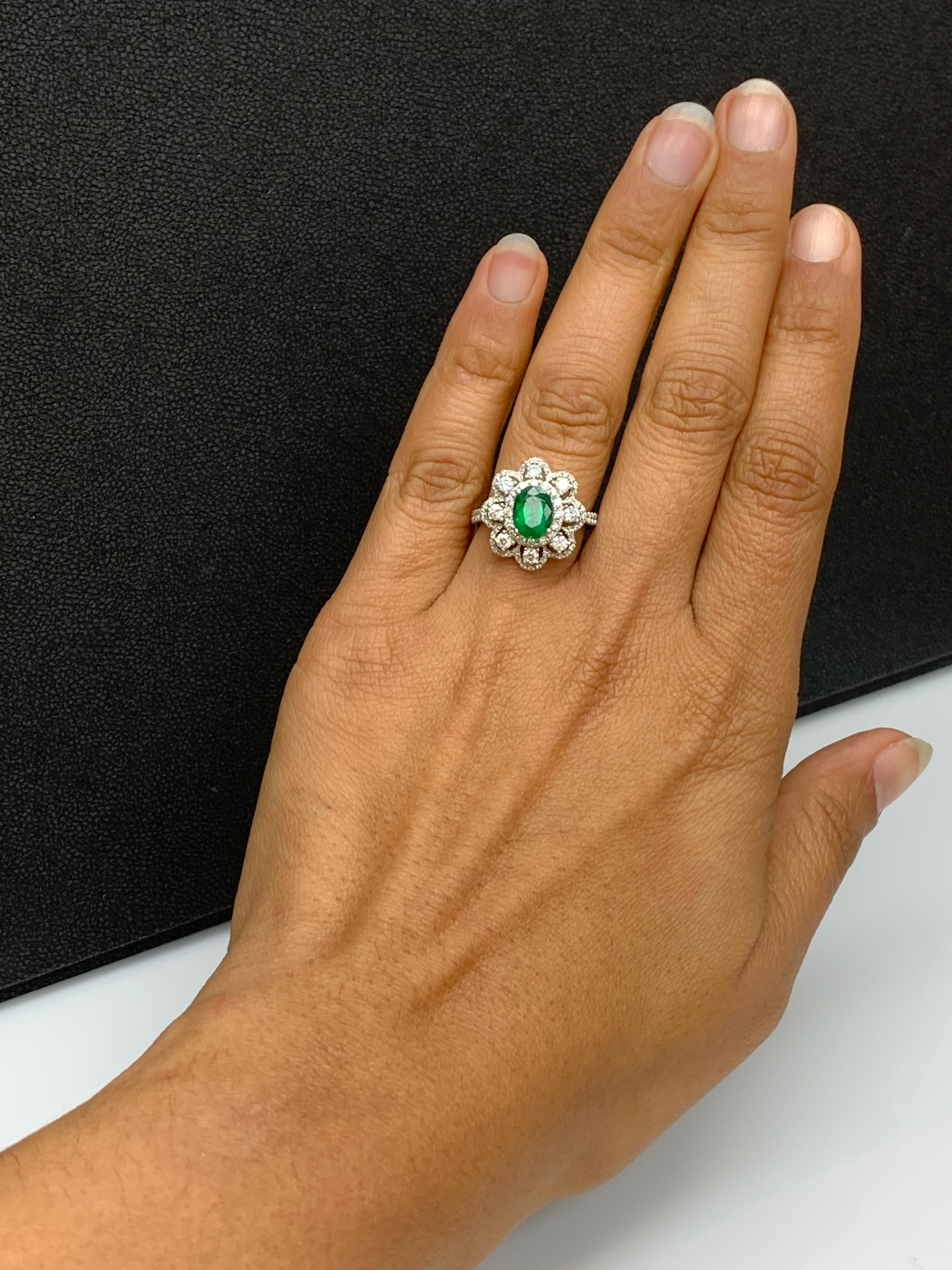1.01 Carat Oval Emerald and Diamond Cocktail Flower Ring in 18K White Gold For Sale 5
