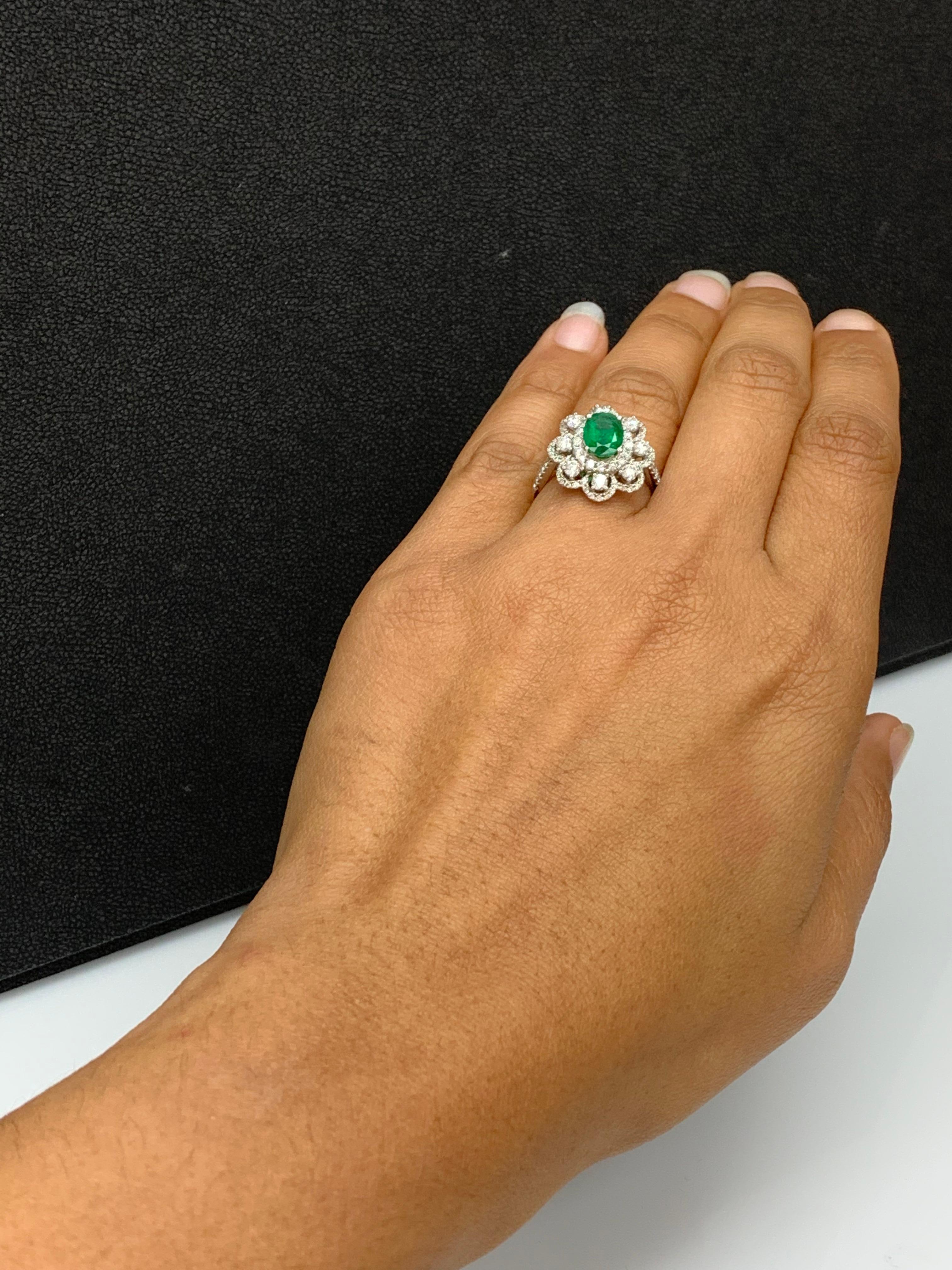 1.01 Carat Oval Emerald and Diamond Cocktail Flower Ring in 18K White Gold For Sale 6
