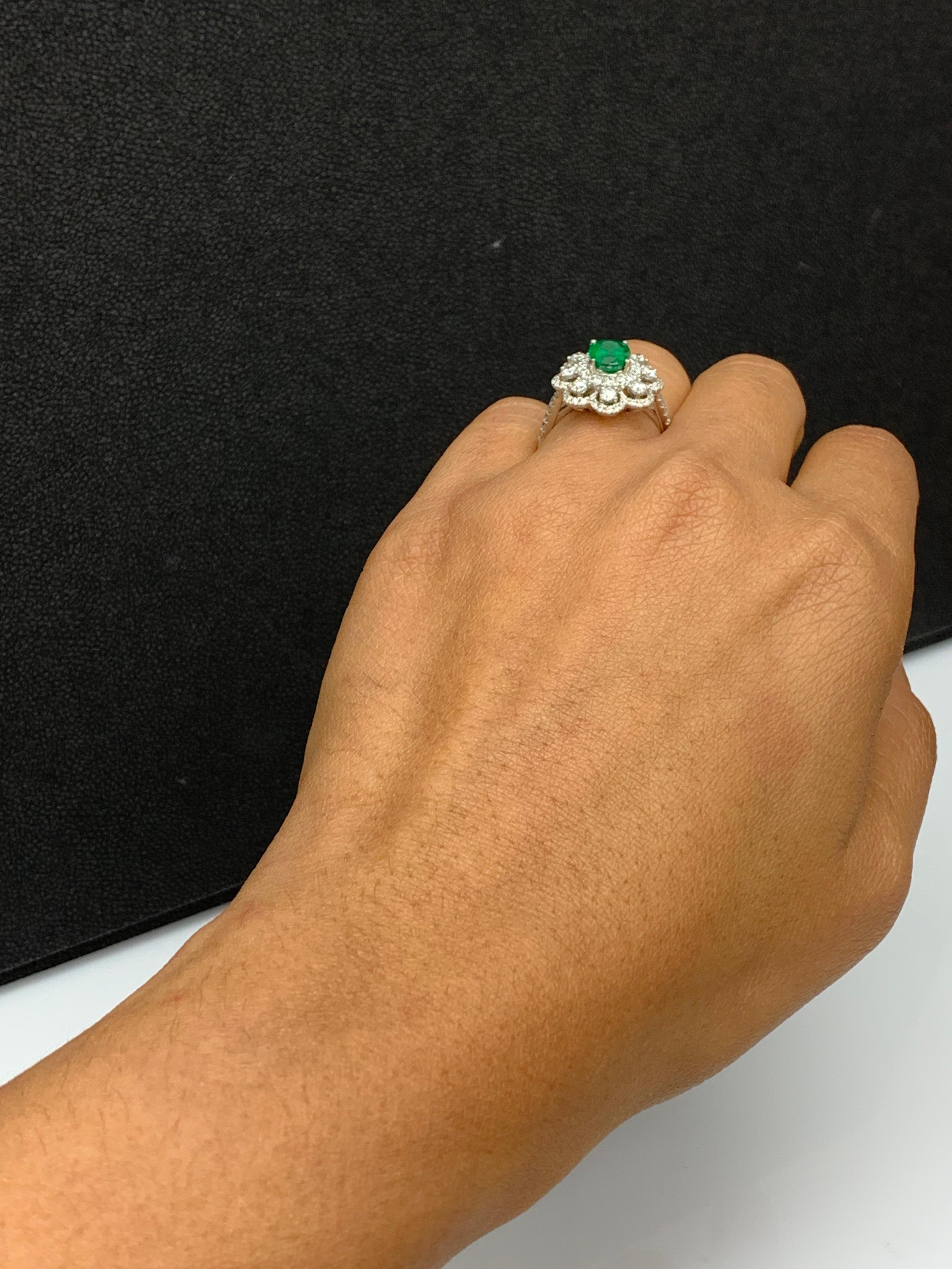 1.01 Carat Oval Emerald and Diamond Cocktail Flower Ring in 18K White Gold For Sale 7