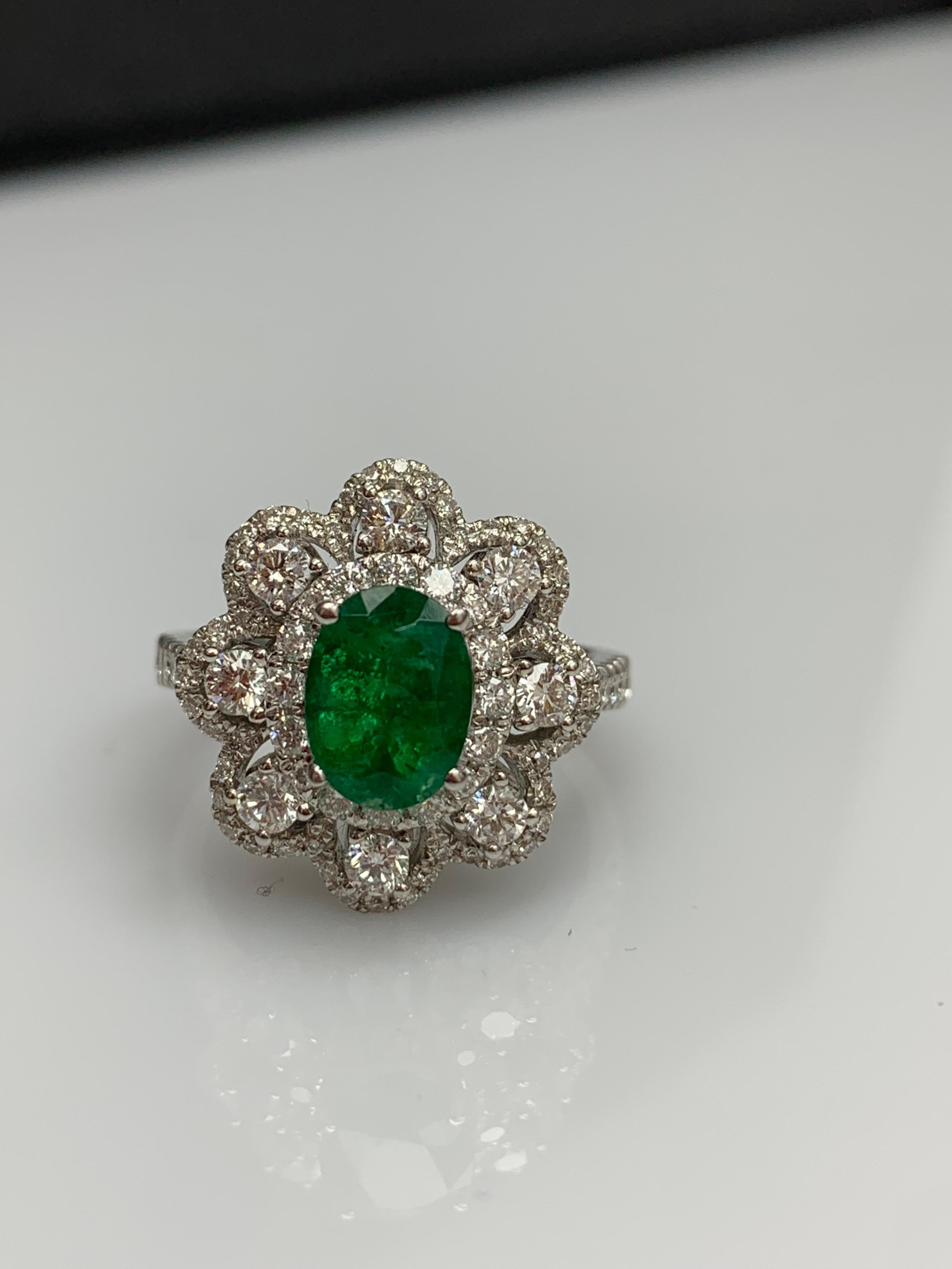 1.01 Carat Oval Emerald and Diamond Cocktail Flower Ring in 18K White Gold For Sale 8