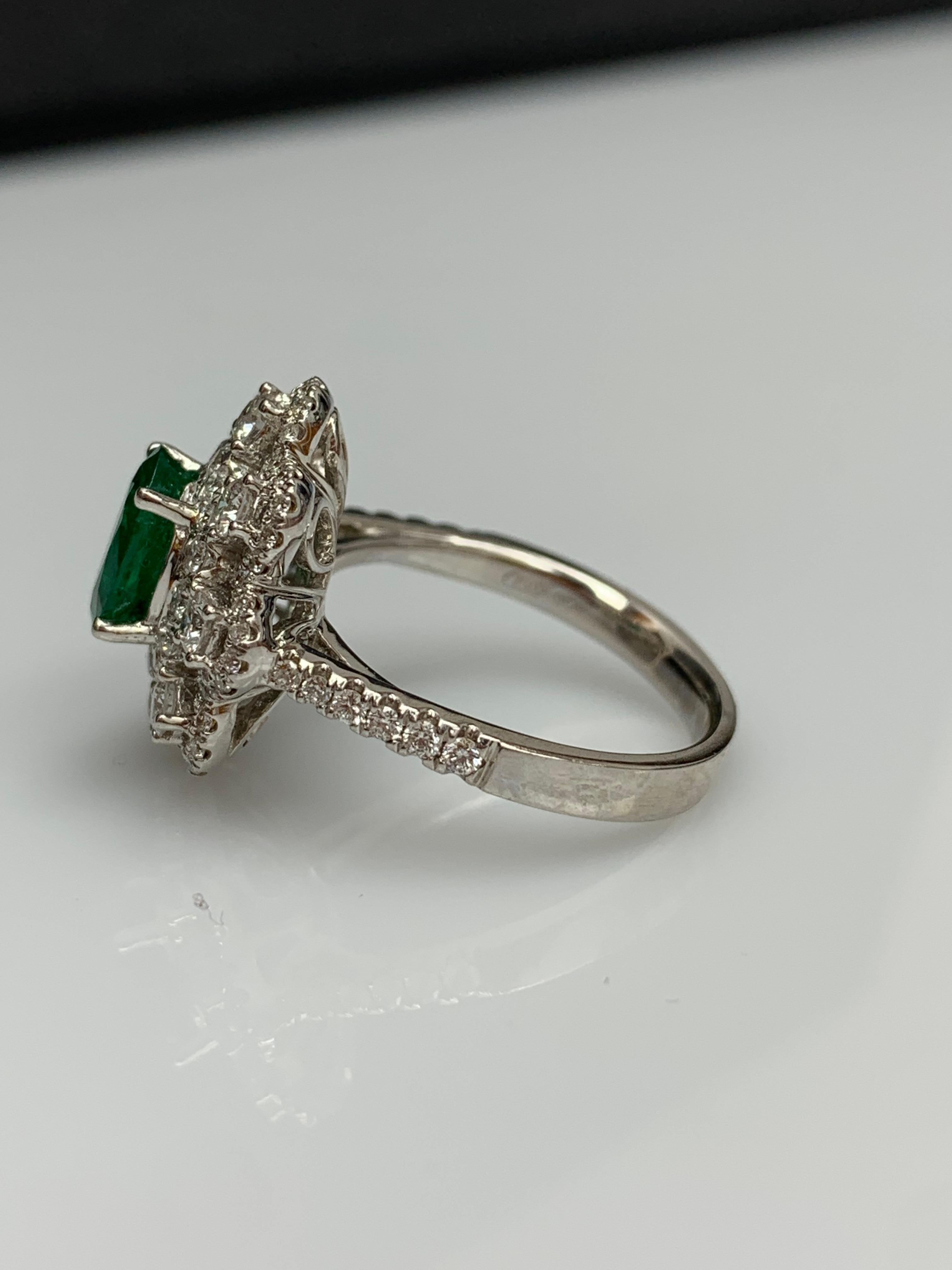 1.01 Carat Oval Emerald and Diamond Cocktail Flower Ring in 18K White Gold For Sale 9
