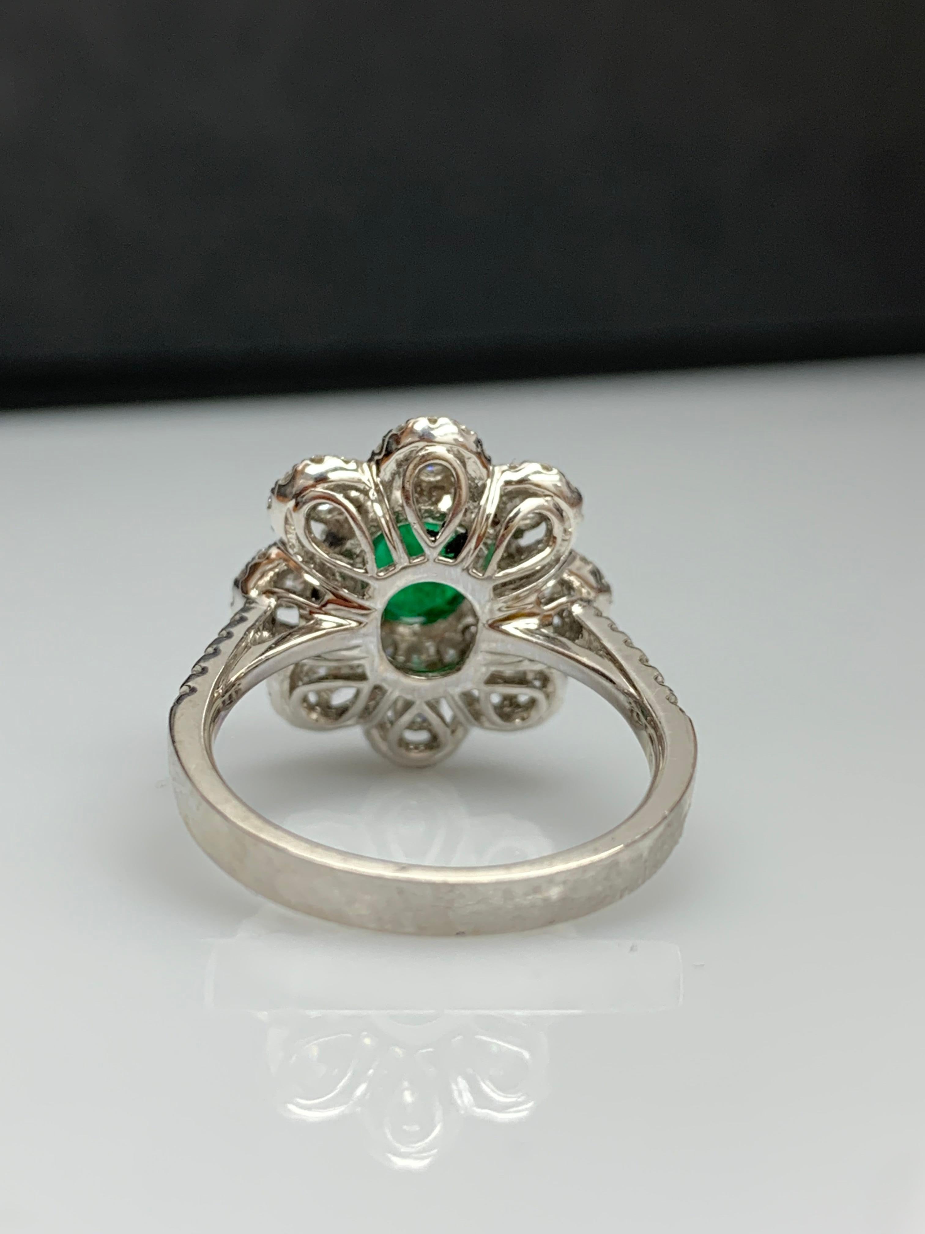1.01 Carat Oval Emerald and Diamond Cocktail Flower Ring in 18K White Gold For Sale 10