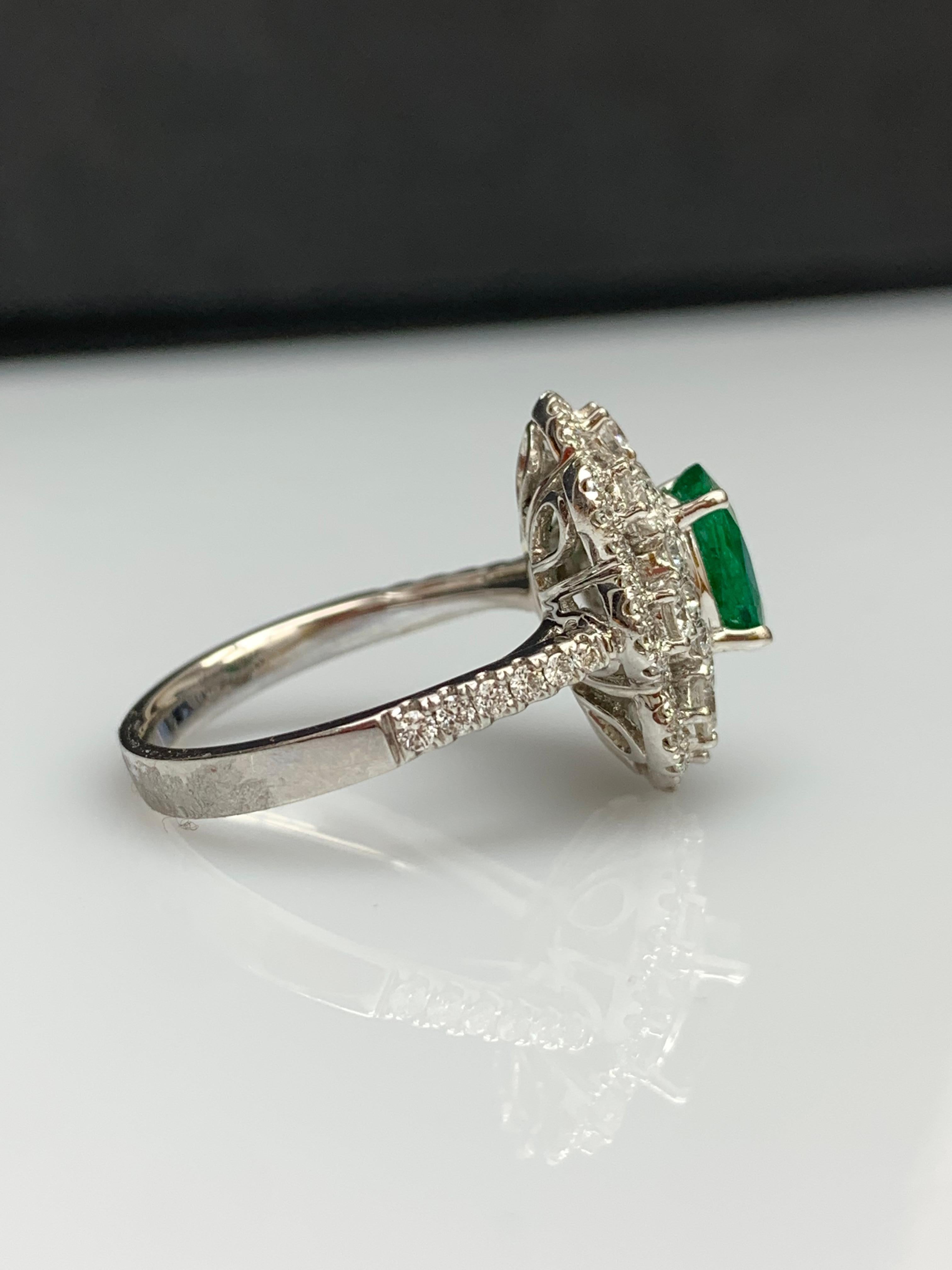 1.01 Carat Oval Emerald and Diamond Cocktail Flower Ring in 18K White Gold For Sale 11