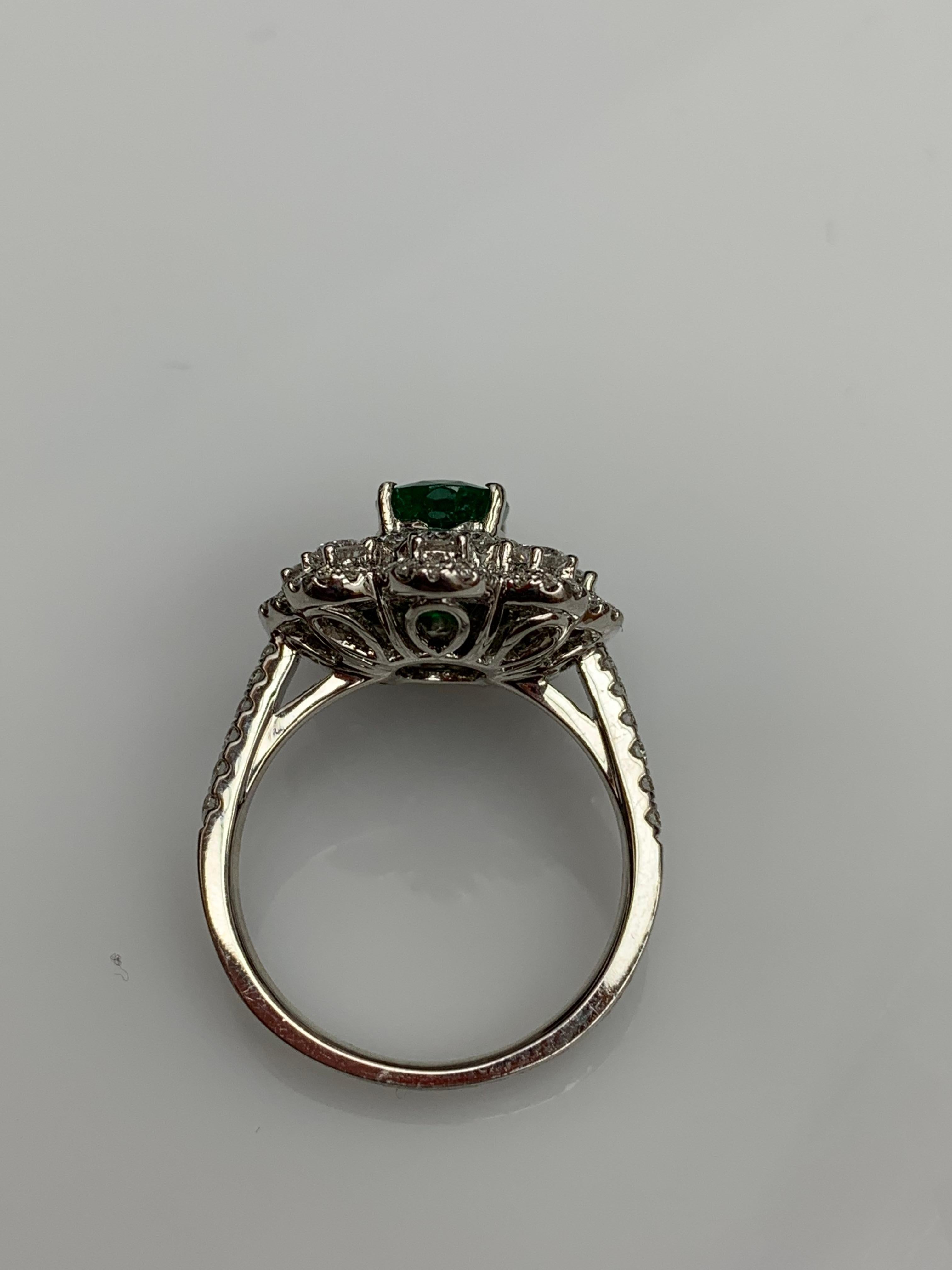 1.01 Carat Oval Emerald and Diamond Cocktail Flower Ring in 18K White Gold For Sale 12