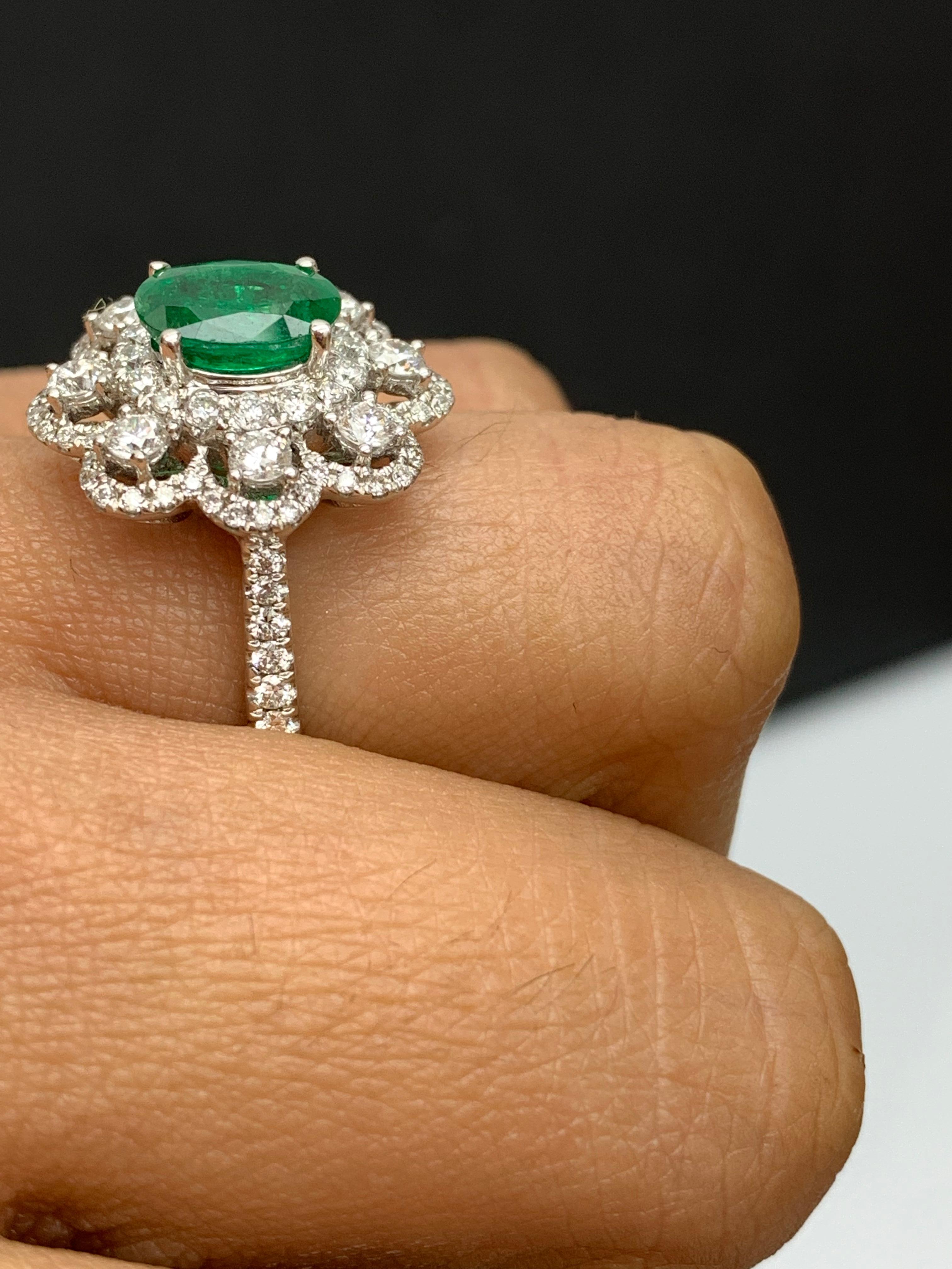 1.01 Carat Oval Emerald and Diamond Cocktail Flower Ring in 18K White Gold For Sale 1