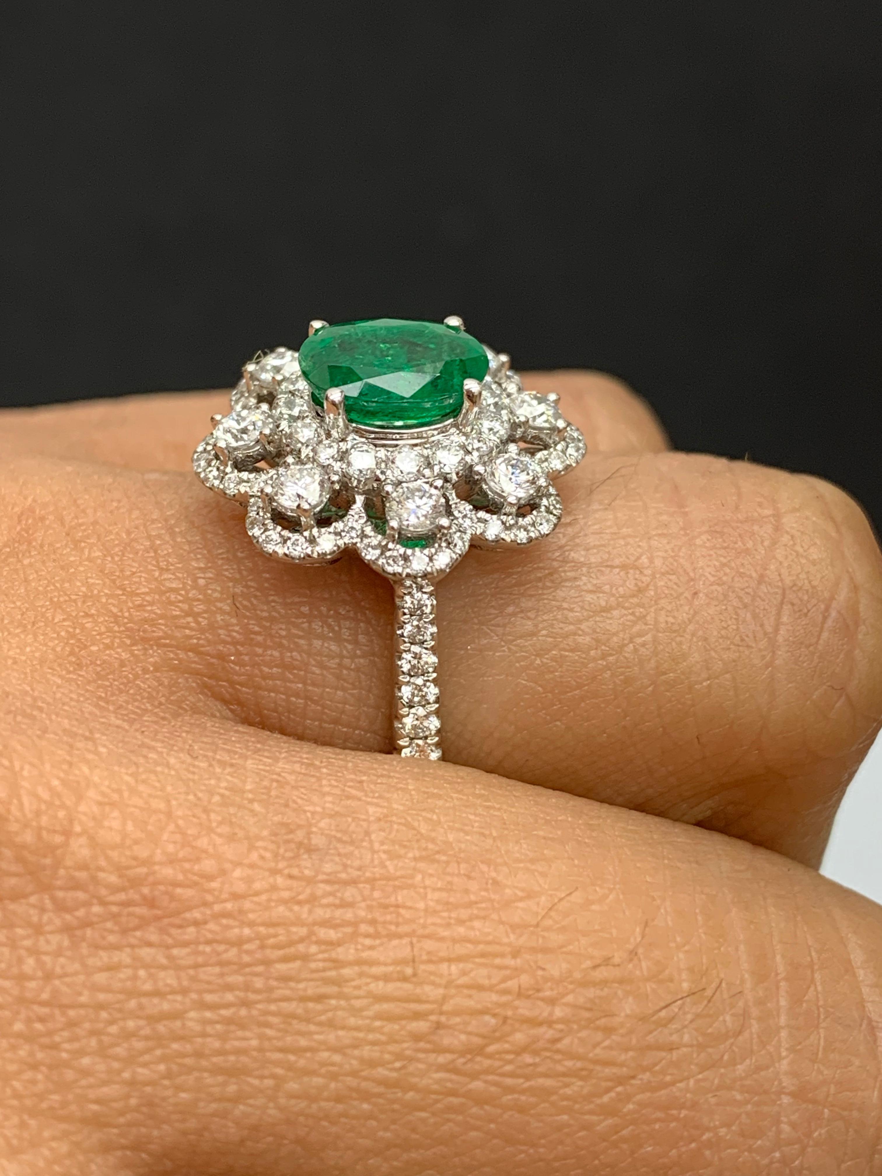1.01 Carat Oval Emerald and Diamond Cocktail Flower Ring in 18K White Gold For Sale 2
