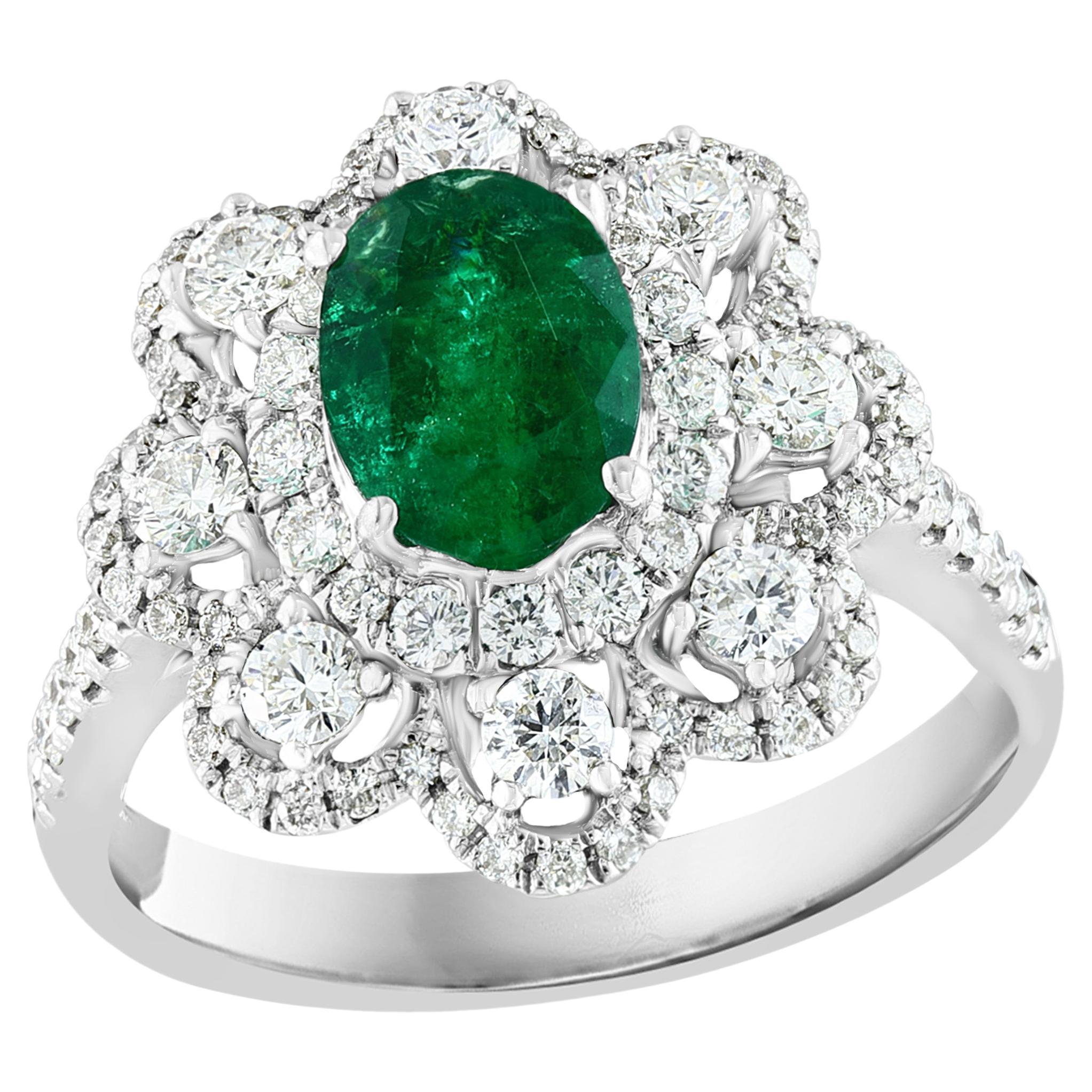 1.01 Carat Oval Emerald and Diamond Cocktail Flower Ring in 18K White Gold For Sale