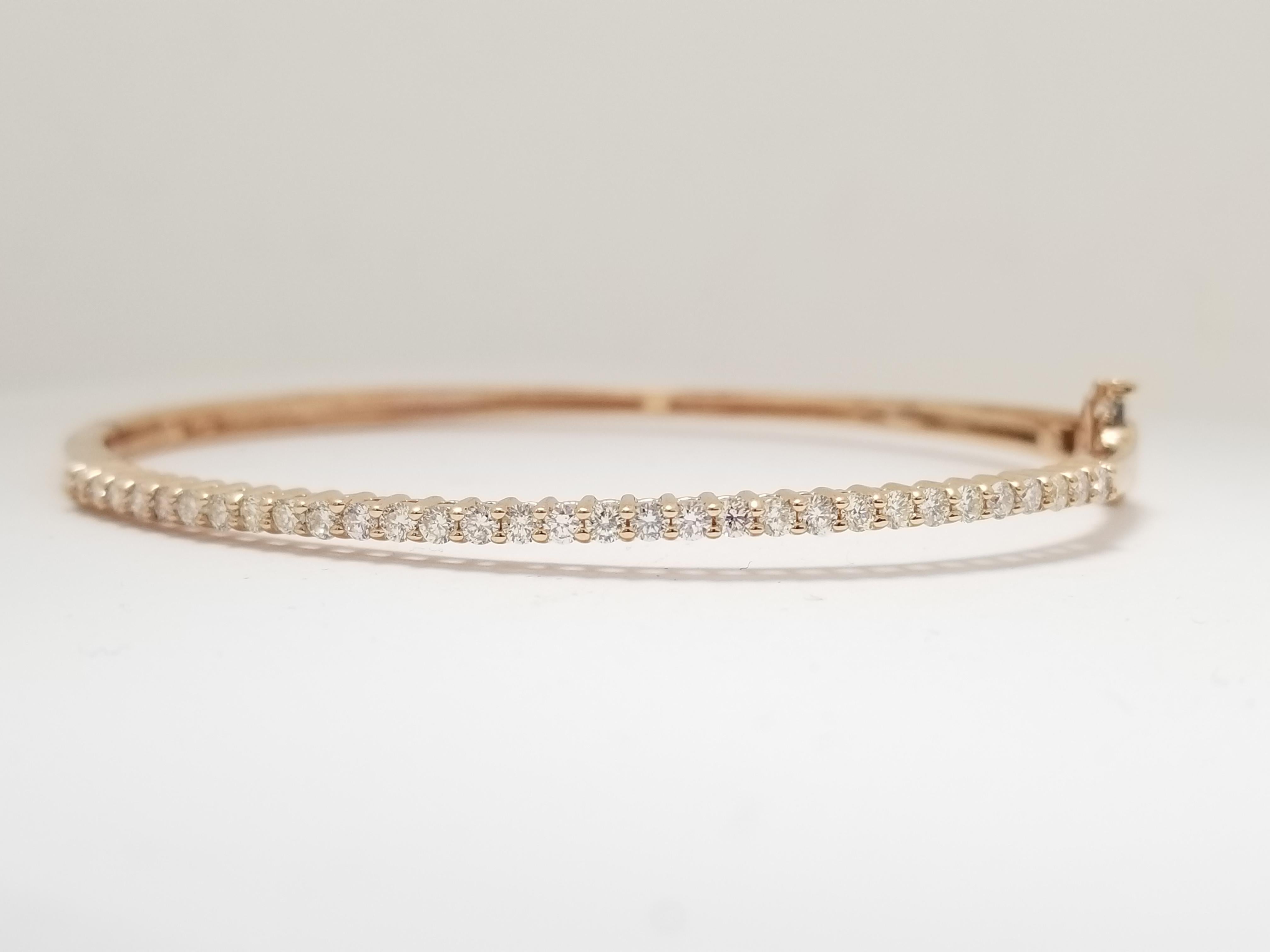 31 pcs natural diamonds paved bangle rose gold 14k, inner diameter 2.50 inch by 2.25 inch. 

Average Color/Clarity: H-VS
Measurements: 2.2mm
