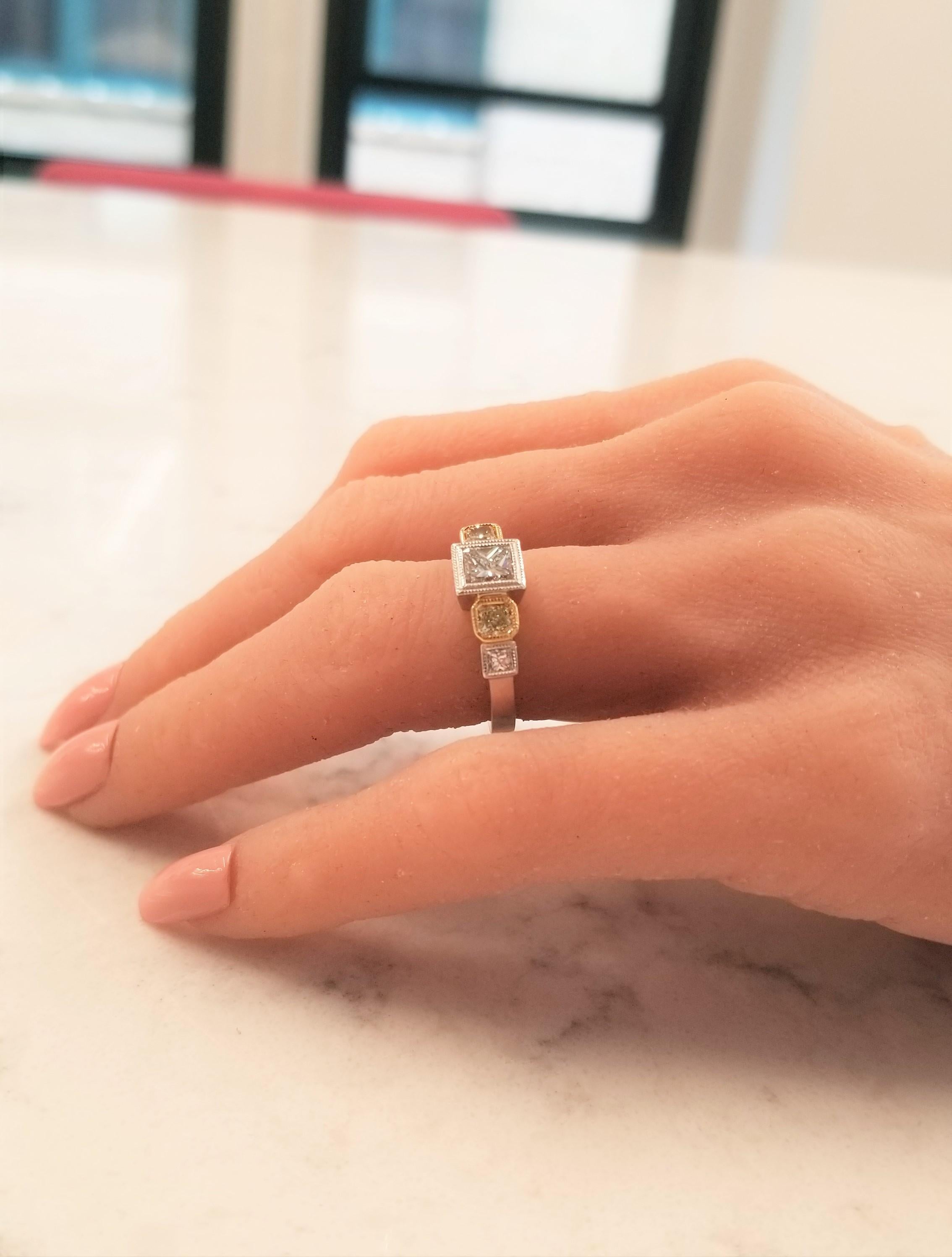 Promise her today, tomorrow, and always with this luxurious platinum and 18k yellow gold diamond ring. No one can resist the intricate, double hand-millgrain beading around the brilliant 1.01 Carat princess cut center diamond. As if that wasn’t