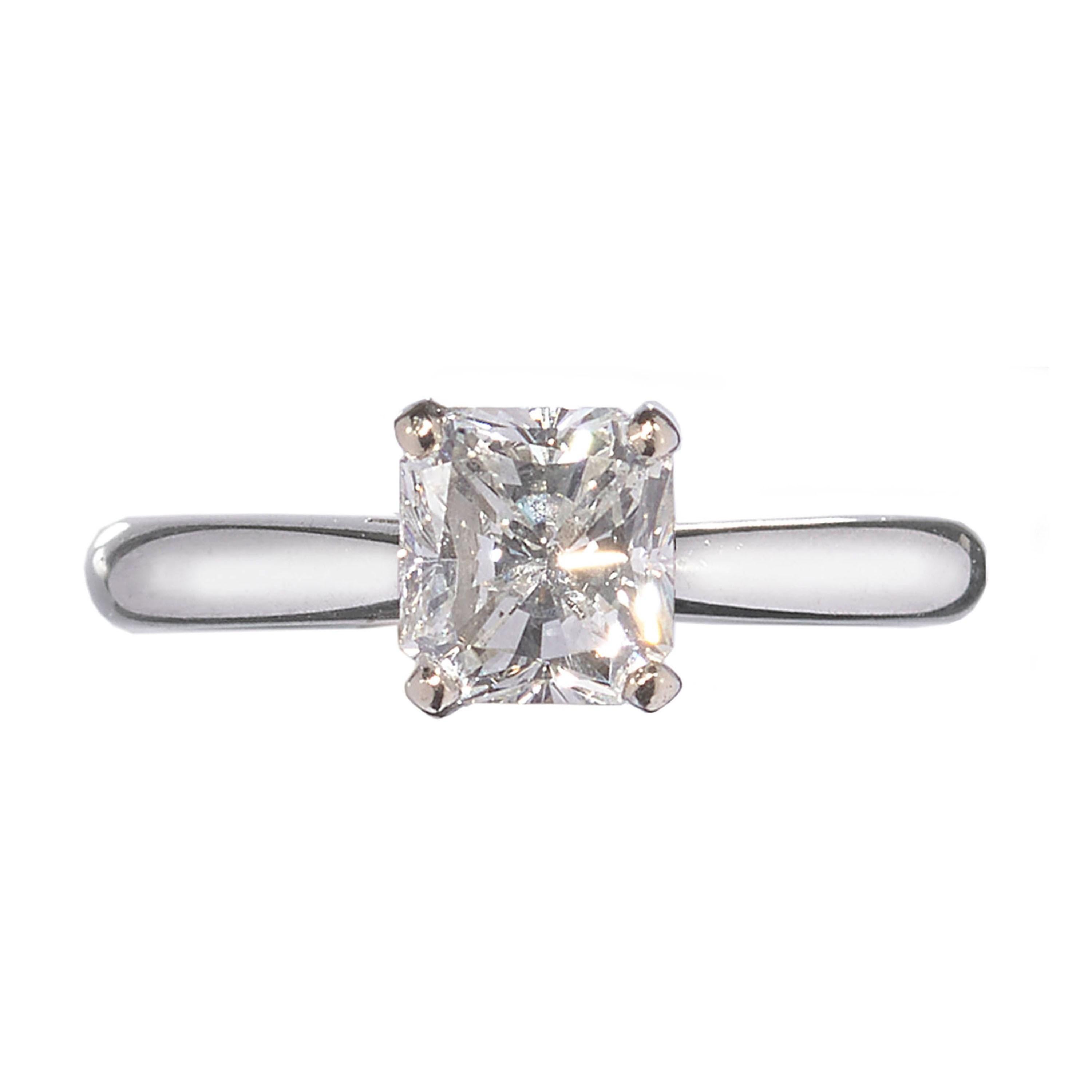 A single stone diamond ring, with a 1.01ct, H colour, SI1 clarity radiant-cut diamond, in a four claw setting, mounted in platinum, accompanied by an EGL certificate.
