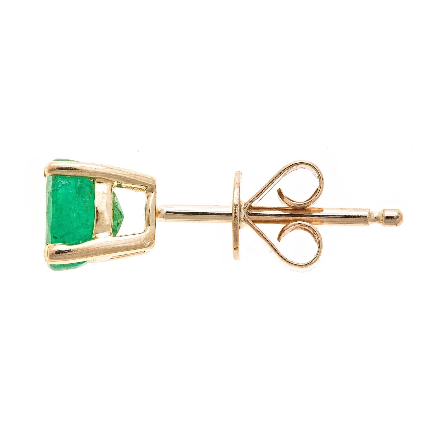 Decorate yourself in elegance with this Earring is crafted from 10-karat Yellow Gold by Gin & Grace Earring. This Earring is made up of 5.0 mm Round-cut (2 pcs) 1.01 carat Emerald. This Earring is weight 0.69 grams. This delicate Earring is polished