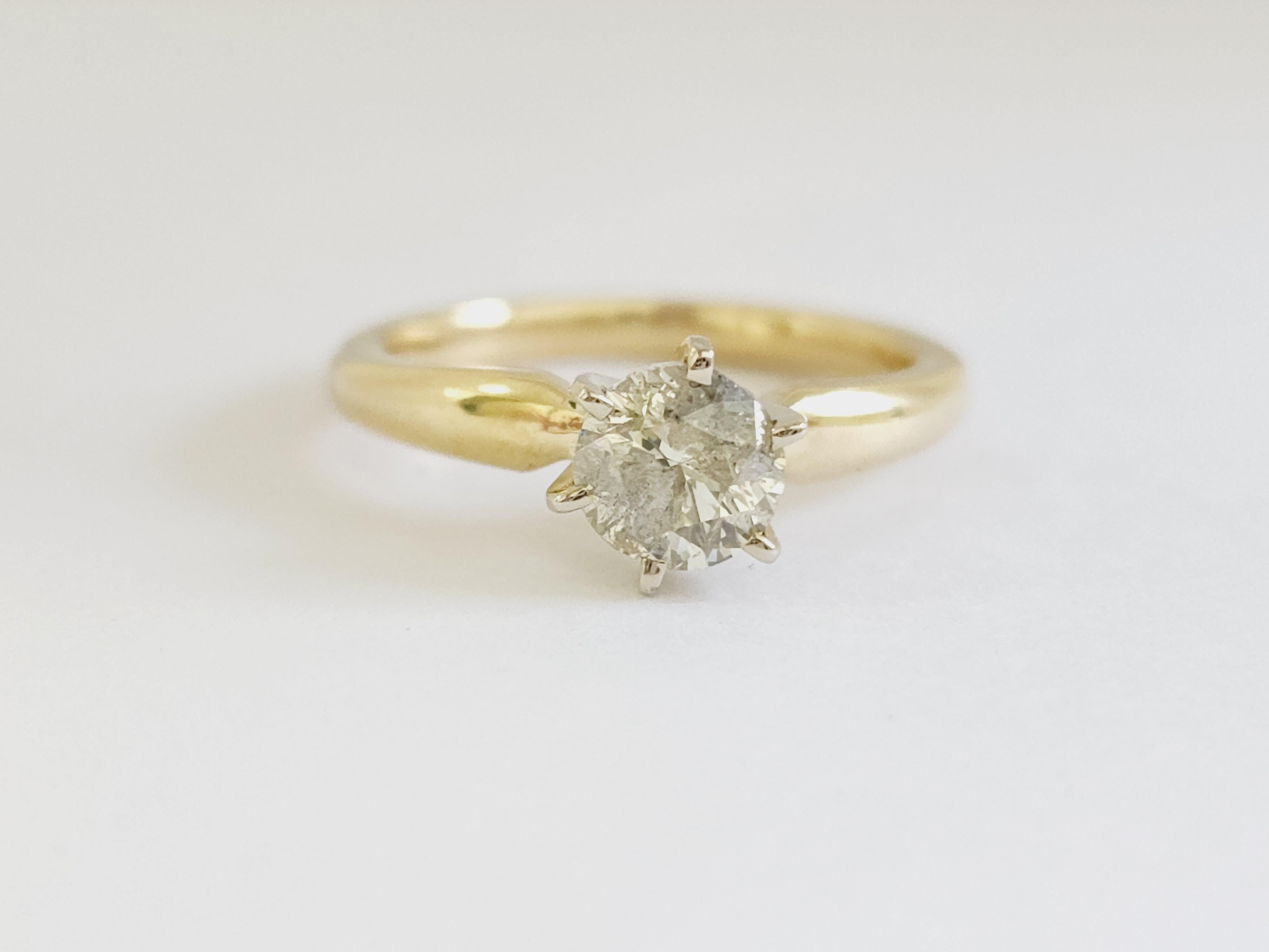 GIA 1.01 ct round brilliant cut natural diamonds. 6 prong solitaire setting, set in 14k yellow gold. Ring Size 7