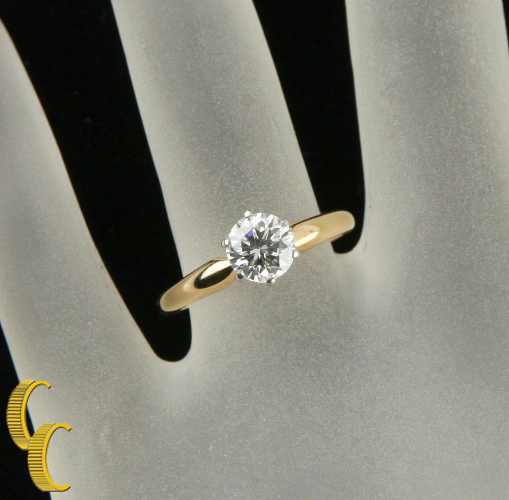 Gorgeous 18k Yellow Gold Solitaire Engagement Ring
Features Round Brilliant Solitaire Diamond
Size 6.25
Includes Appraisal Certificate Which Reads:
Summation of Appraisal (S.O.A.)
S.O.A. NUMBER: 8CRT3849
SHAPE/CUT: ROUND BRILLIANT
MEASUREMENT: 5.98