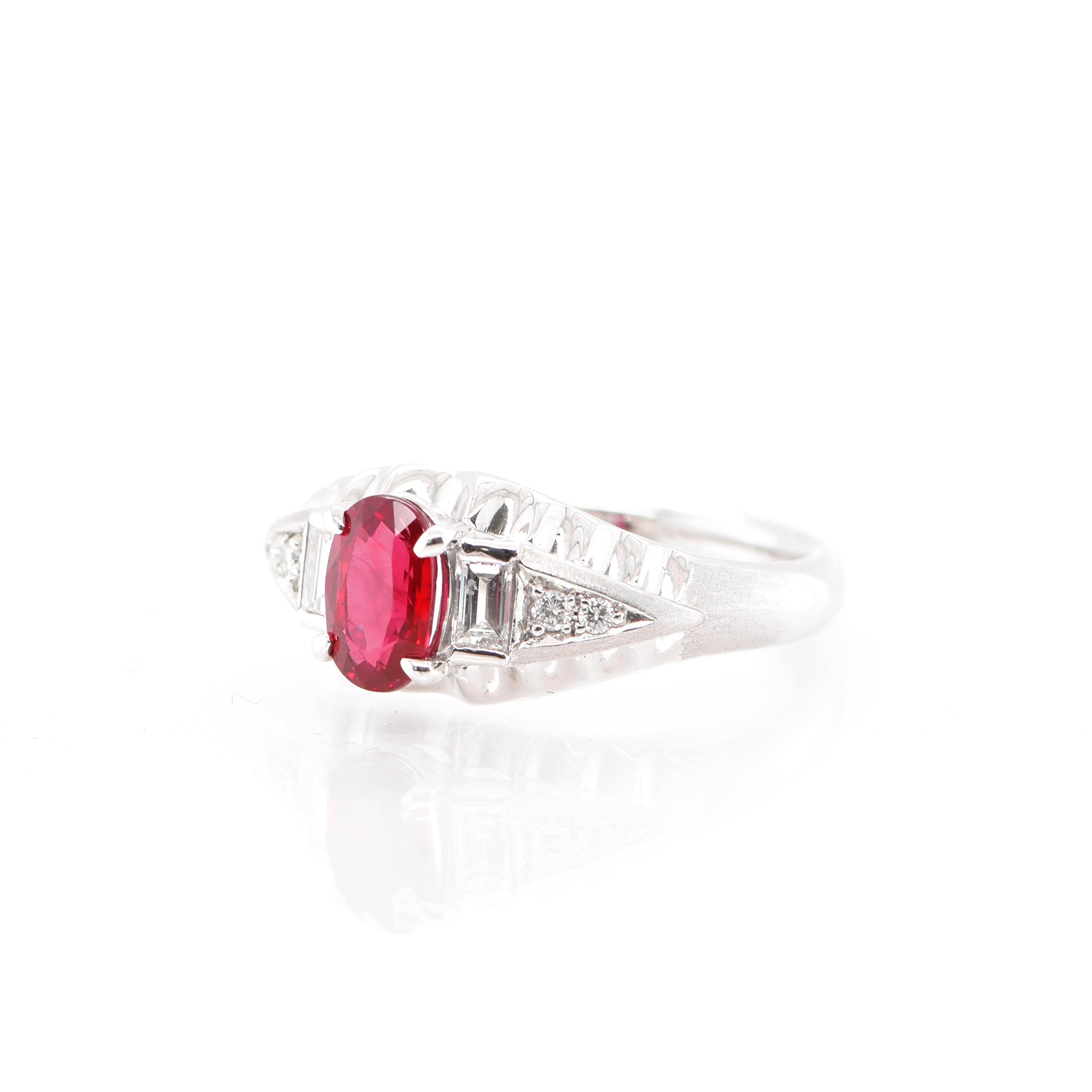 A beautiful ring featuring a GIA Certified 1.01 Carat Natural Untreated (No Heat) Ruby and 0.25 Carats of Diamond Accents set in Platinum. The Ruby exhibits beautiful even color and Luster. Rubies are referred to as 