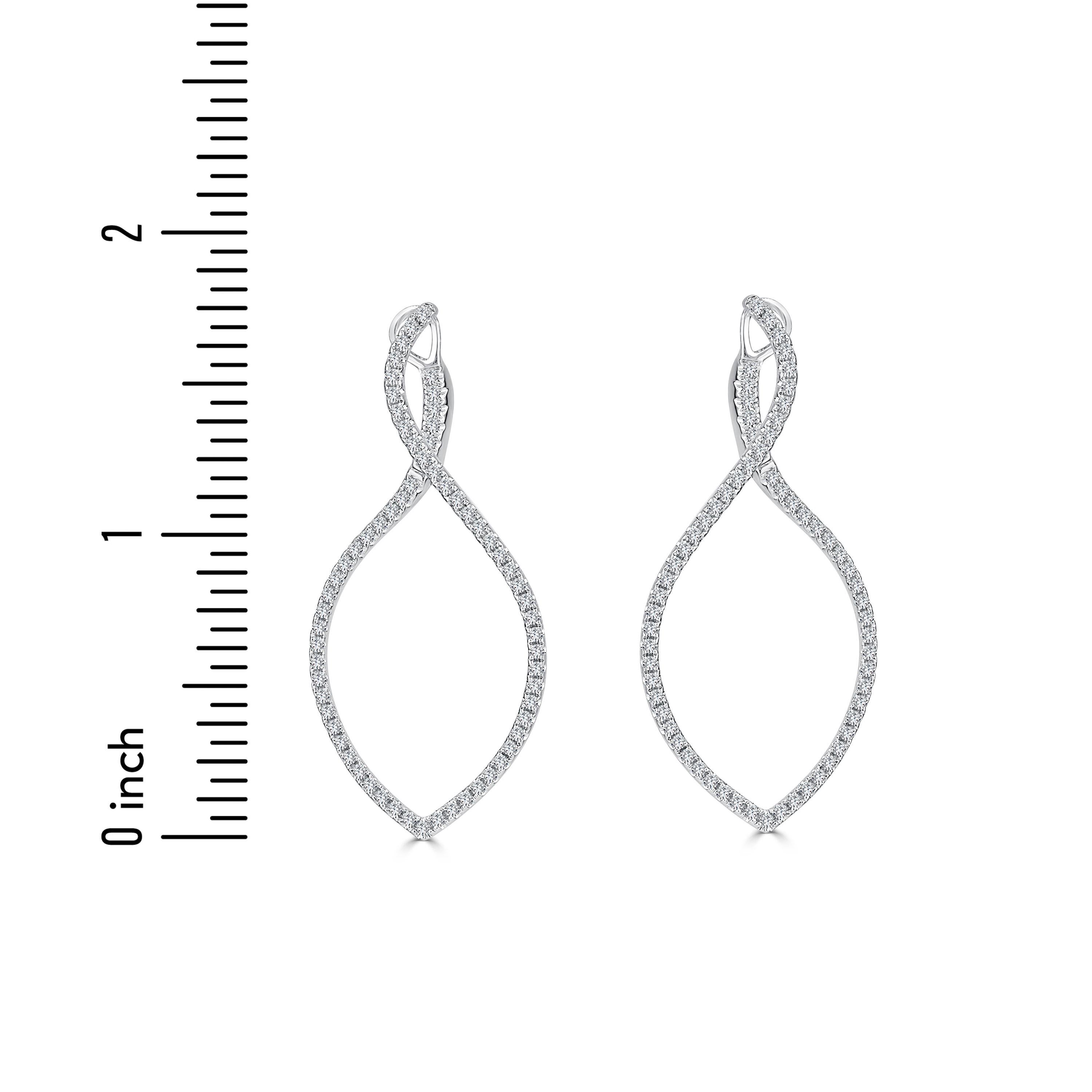 These exquisite hoop earrings offer a unique twist on the classic style by incorporating an elegant teardrop swirl design. Adorning the front of the earrings are 1.01 carats of round white diamonds, adding a touch of sparkle and sophistication. What
