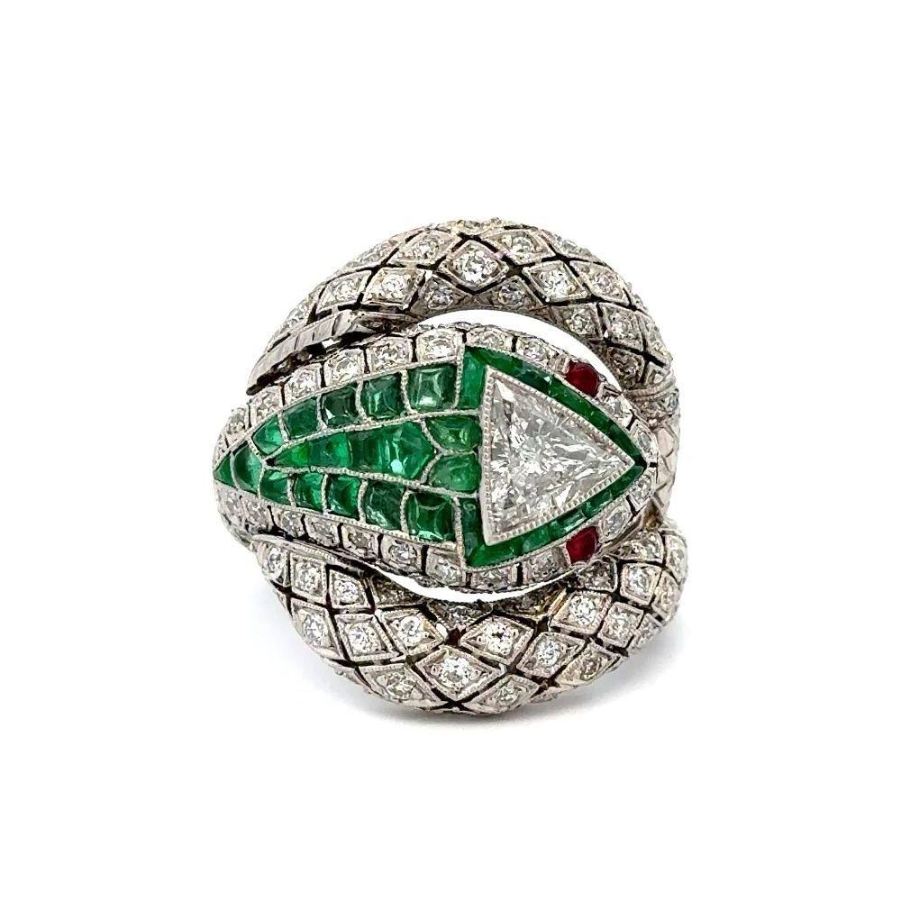 Simply Beautiful! Striking Red Carpet GIA Trillion Diamond and Emerald Platinum Serpent Snake Fabulous Statement Ring. The Head securely Hand set with a Trillion GIA Diamond, weighing approx. 1.01 Carats. Surrounded by Emeralds, approx. 3.53tcw,