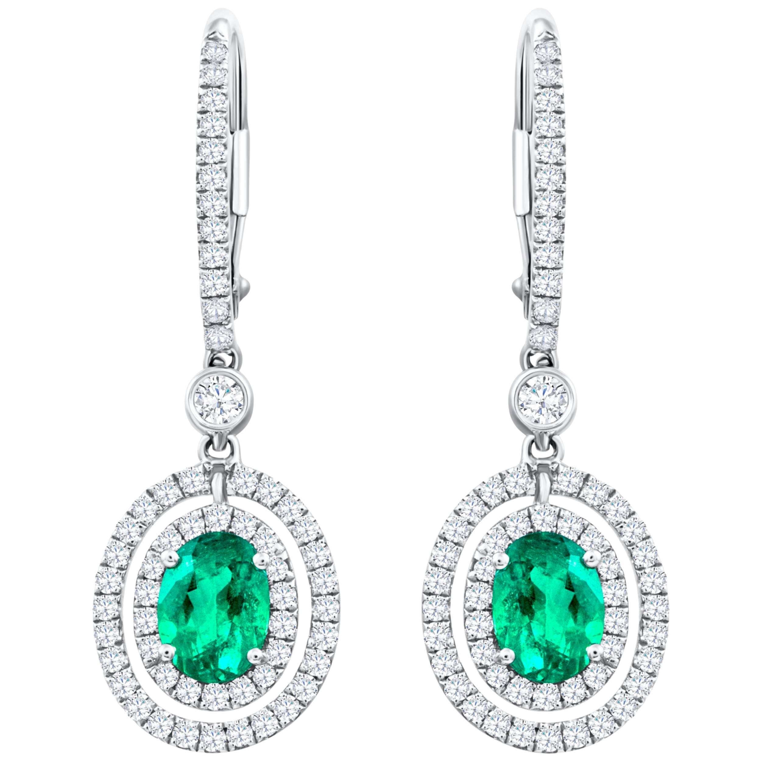 Boucles d'oreilles pendantes avec émeraude et diamant de 1,01 carats (taille ovale)
