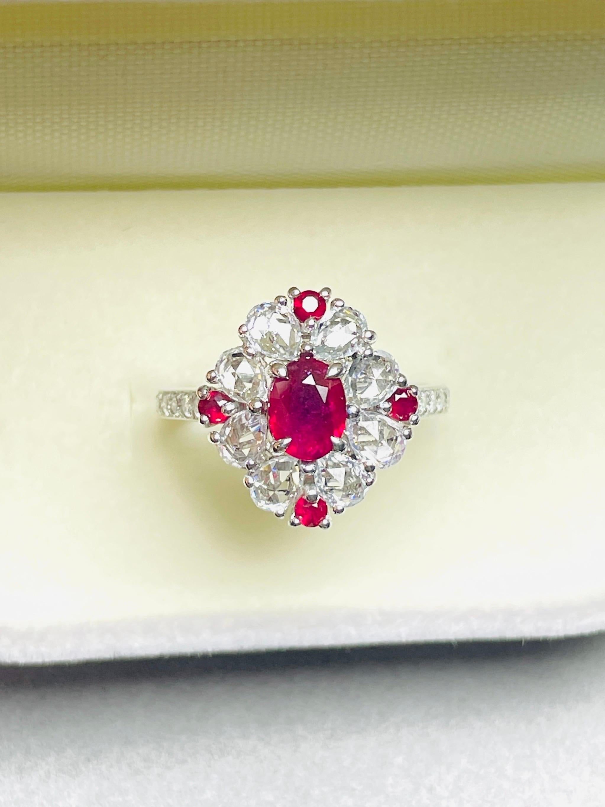 E028	
GIA Certified Unheated Burma Ruby Pigeon Blood Ring 14K 3.72Gram 

Or : 14K
Poids 3.72G
Taille : 14#	

Pierre principale : 
1.01ct GIA Certificate Burma Ruby Unheated Pigeon Blood eye clean 

Pierre latérale :
Saphir blanc-1,66ct/8P